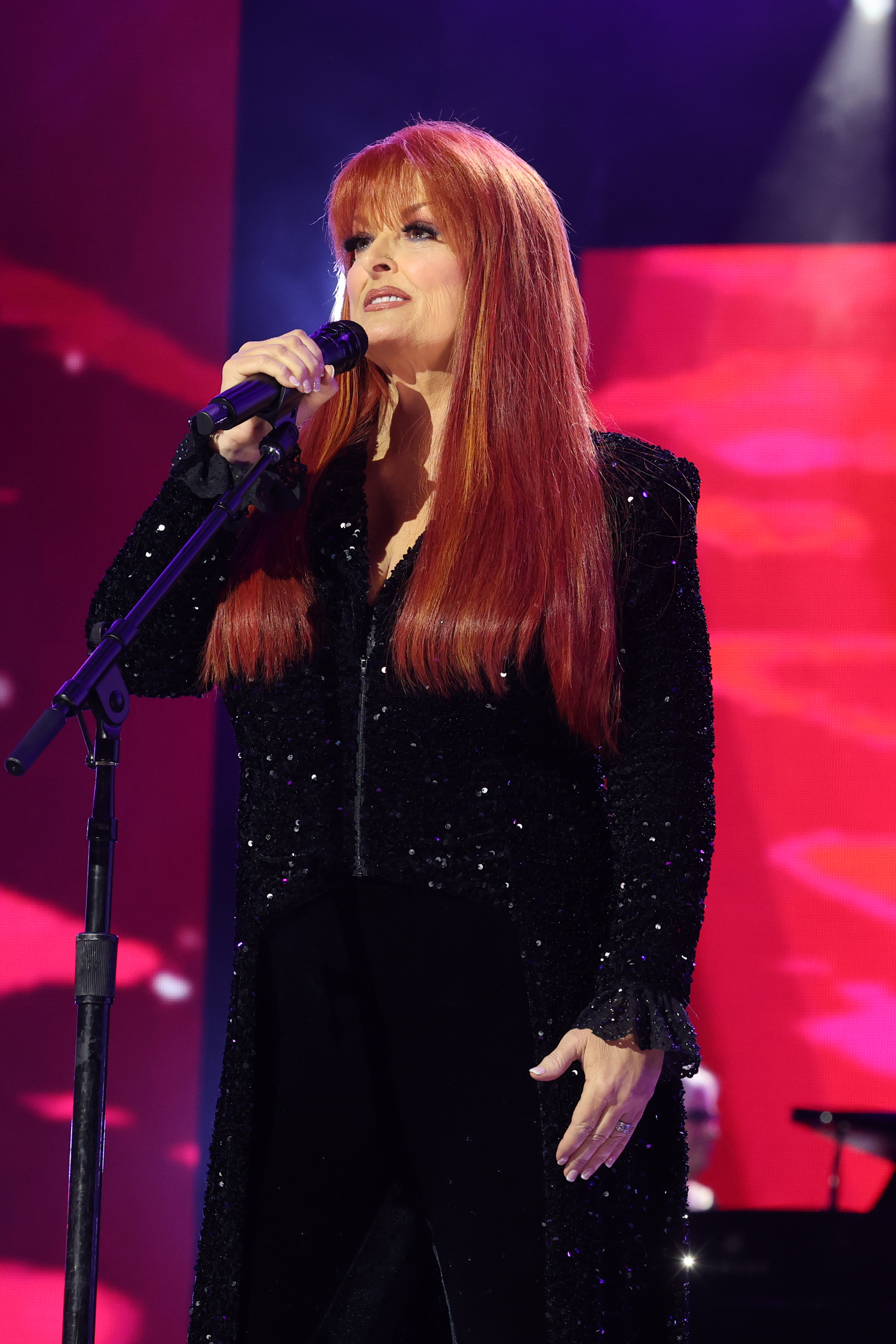 Wynonna Judd performing on stage at the 2025 MusiCares Persons of the Year event. | Source: Getty Images