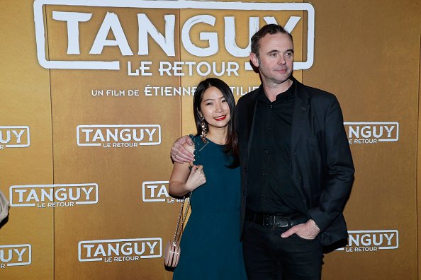 Les acteurs du film Weiting Chao et Eric Berger assistent à la première parisienne de "Tanguy le Retour" au Cinéma Gaumont Capucines le 09 avril 2019 à Paris, France. | Photo : Getty Images