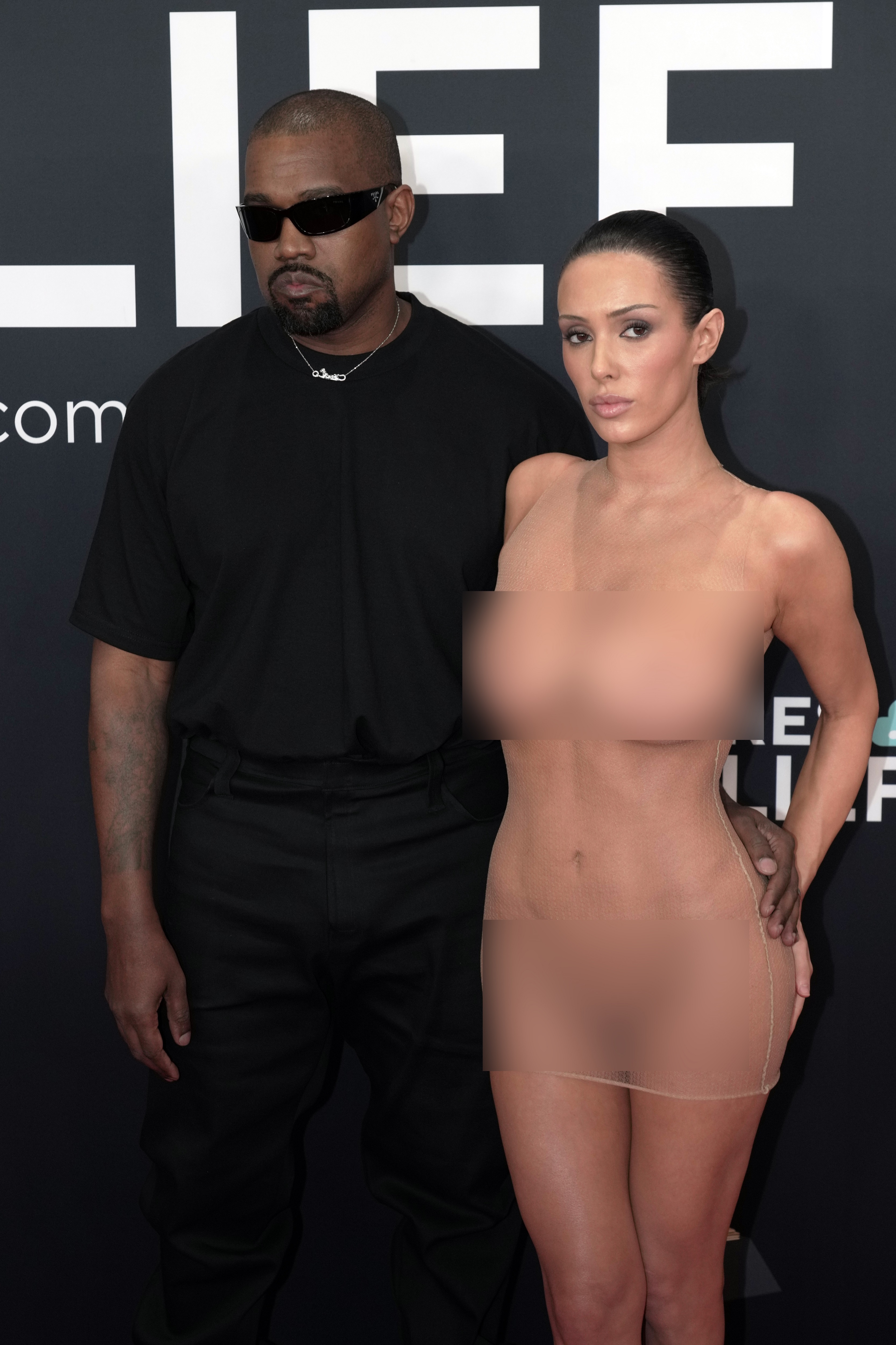 Kanye West and Bianca Censori (whose outfit has been blurred) attend the 67th GRAMMY Awards on February 2, 2025, in Los Angeles, California | Source: Getty Images