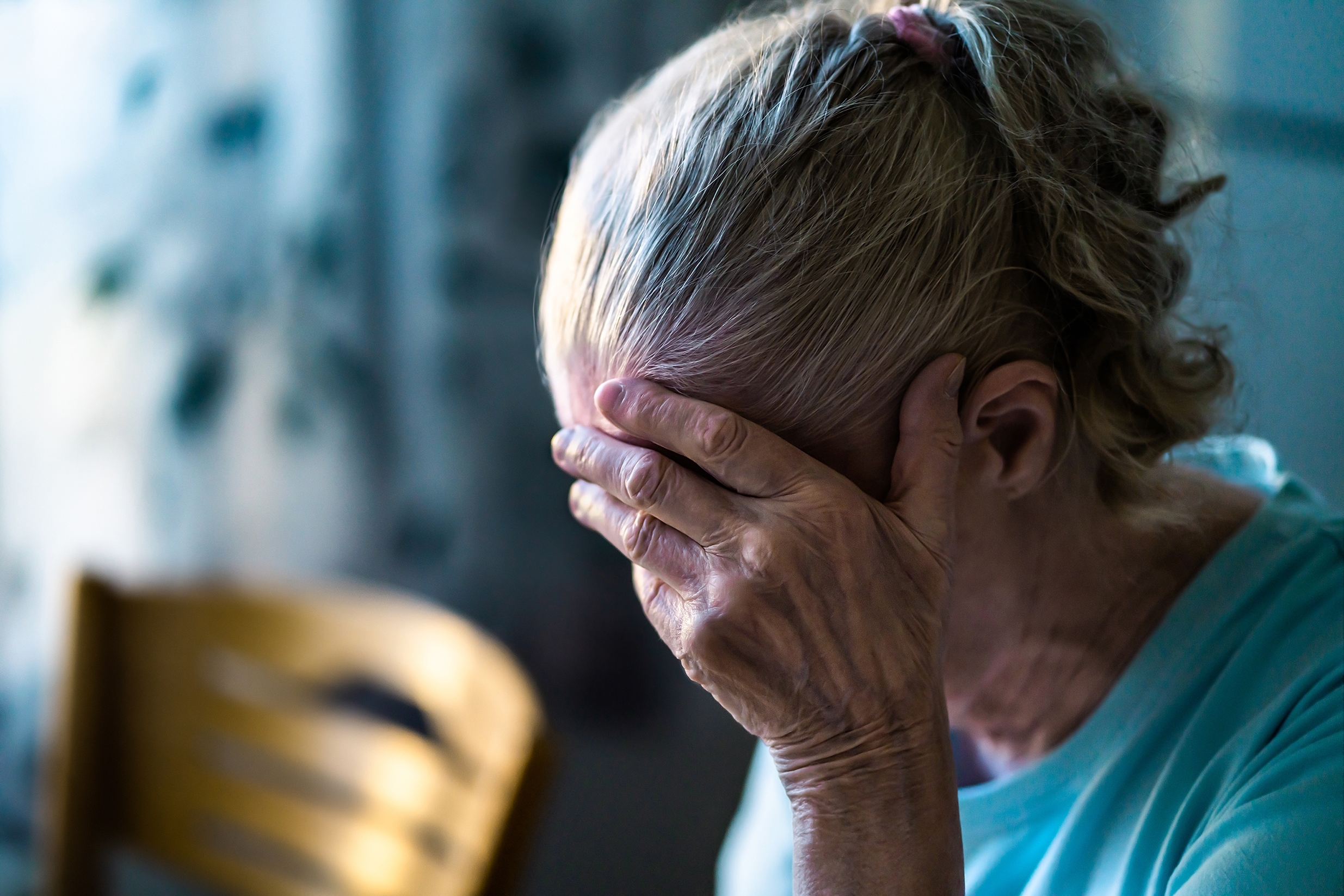 Sad senior old woman | Source: Shutterstock
