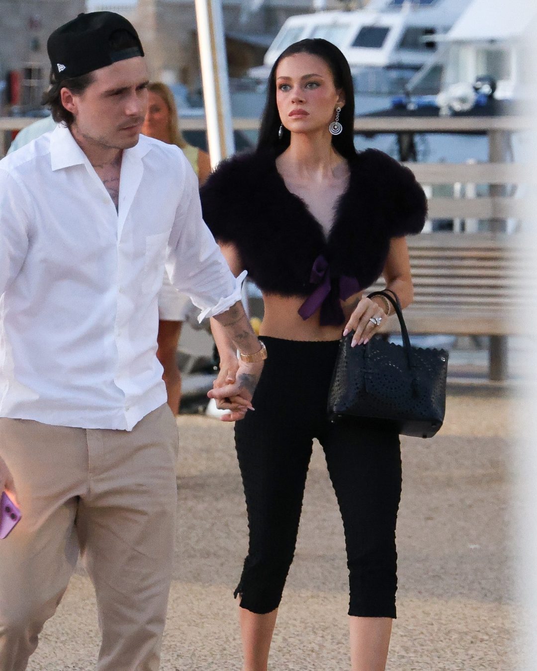 Brooklyn Beckham and Nicola Peltz Beckham walk together in Saint-Tropez in photos posted on July 19, 2025. | Source: Instagram/pagesix