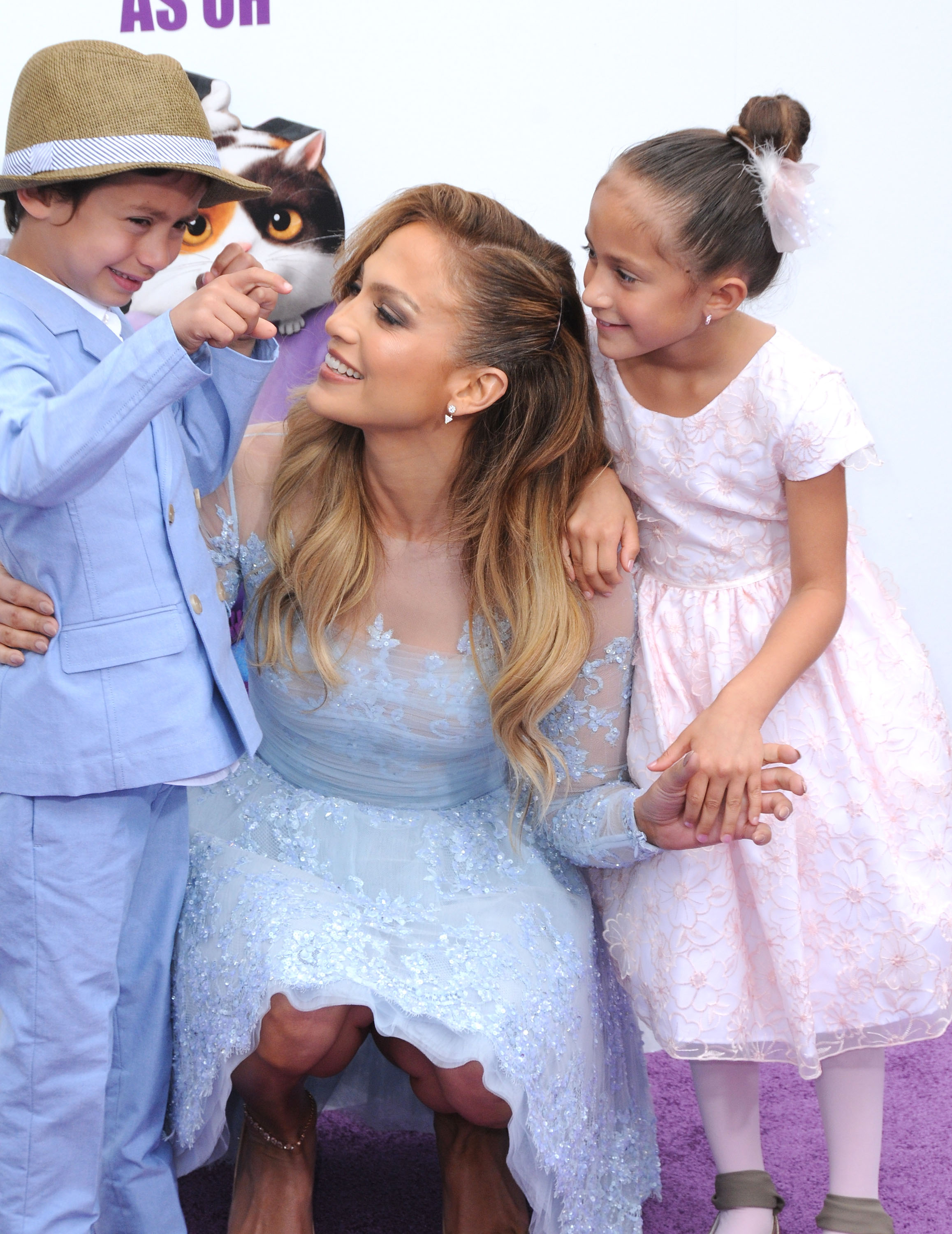 Jennifer Lopez, accompanied by her son Maximillian David Muniz and daughter Emme Maribel Muniz, graces the premiere of Twentieth Century Fox and Dreamworks Animation's "Home" on March 22, 2015, in Westwood, California | Source: Getty Images