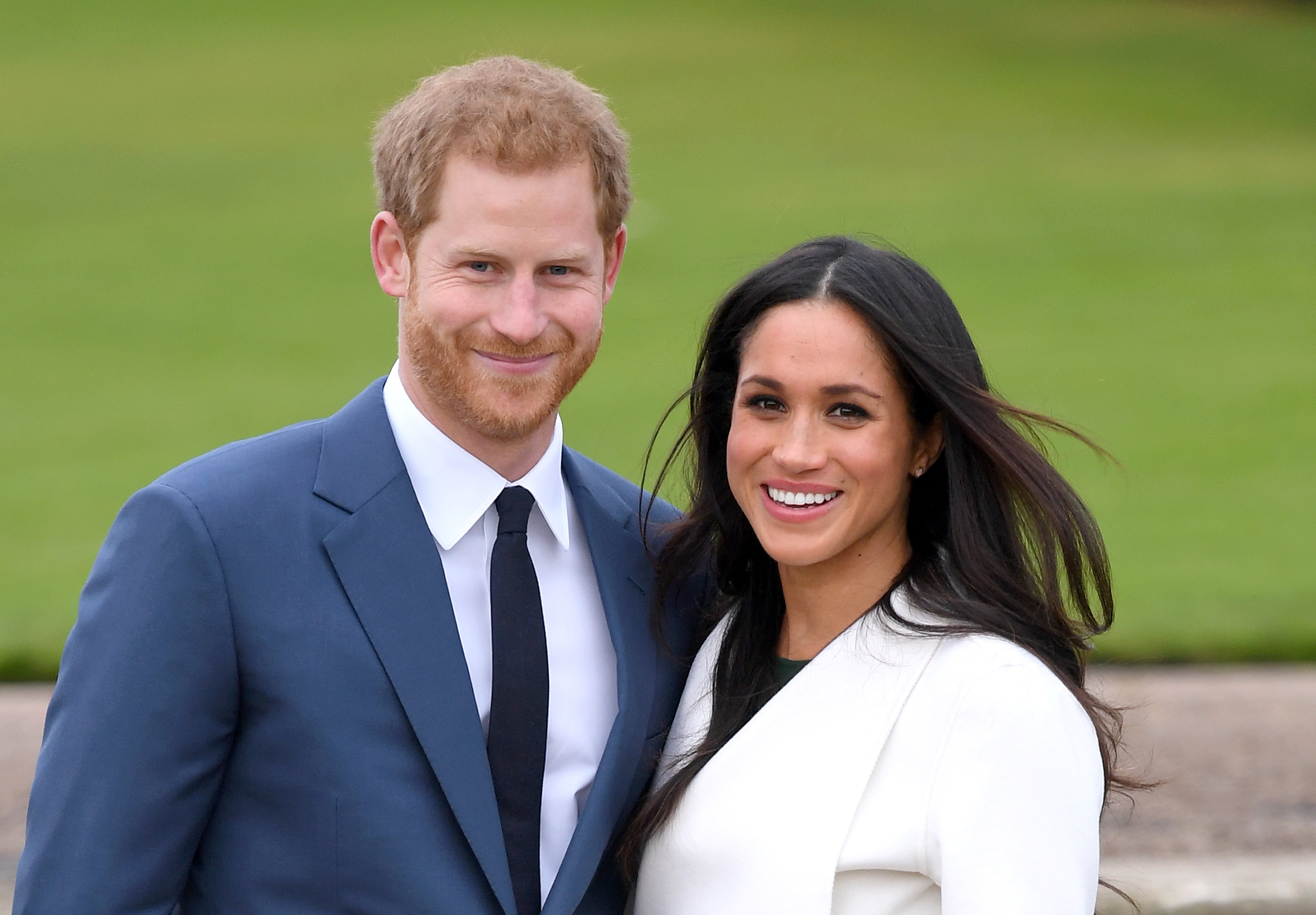 Prince Harry and Meghan Markle attend an official photocall to announce their engagement at The Sunken Gardens at Kensington Palace on November 27, 2017 in London, England ┃Source: Getty Images