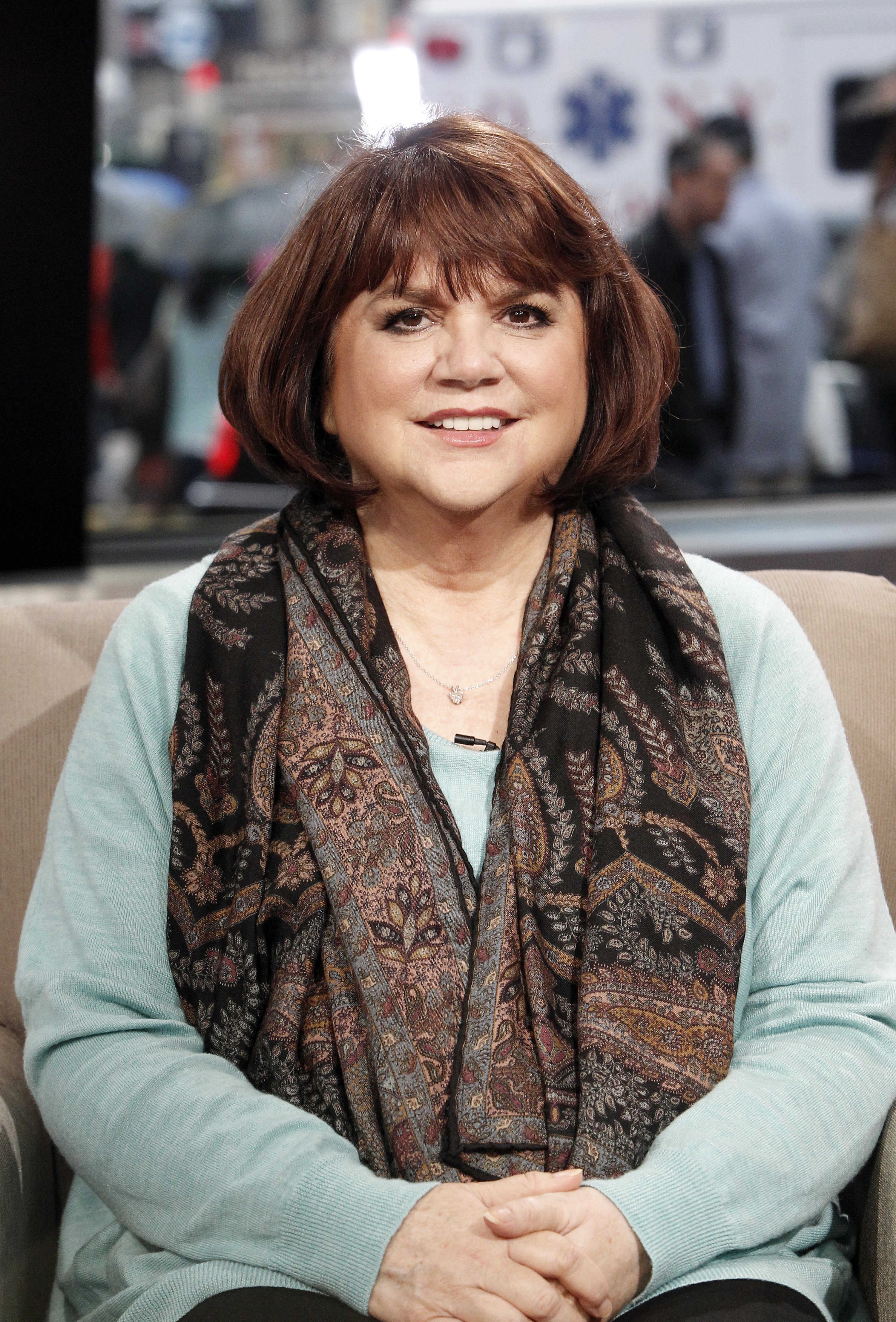 Linda Ronstadt discusses her book "Simple Dreams: A Musical Memoir" on September 16, 2013, on "Good Morning America" | Source: Getty Images