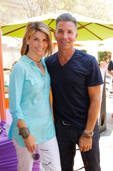 Lori Loughlin and Mossimo Giannulli attend 6th Annual Kidstock Music And Arts Festival on June 3, 2012 | Photo: Getty Images