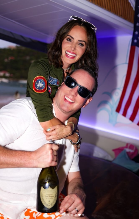 Kyle and Samantha Busch pose together during a celebration | Source: Instagram/samanthabusch