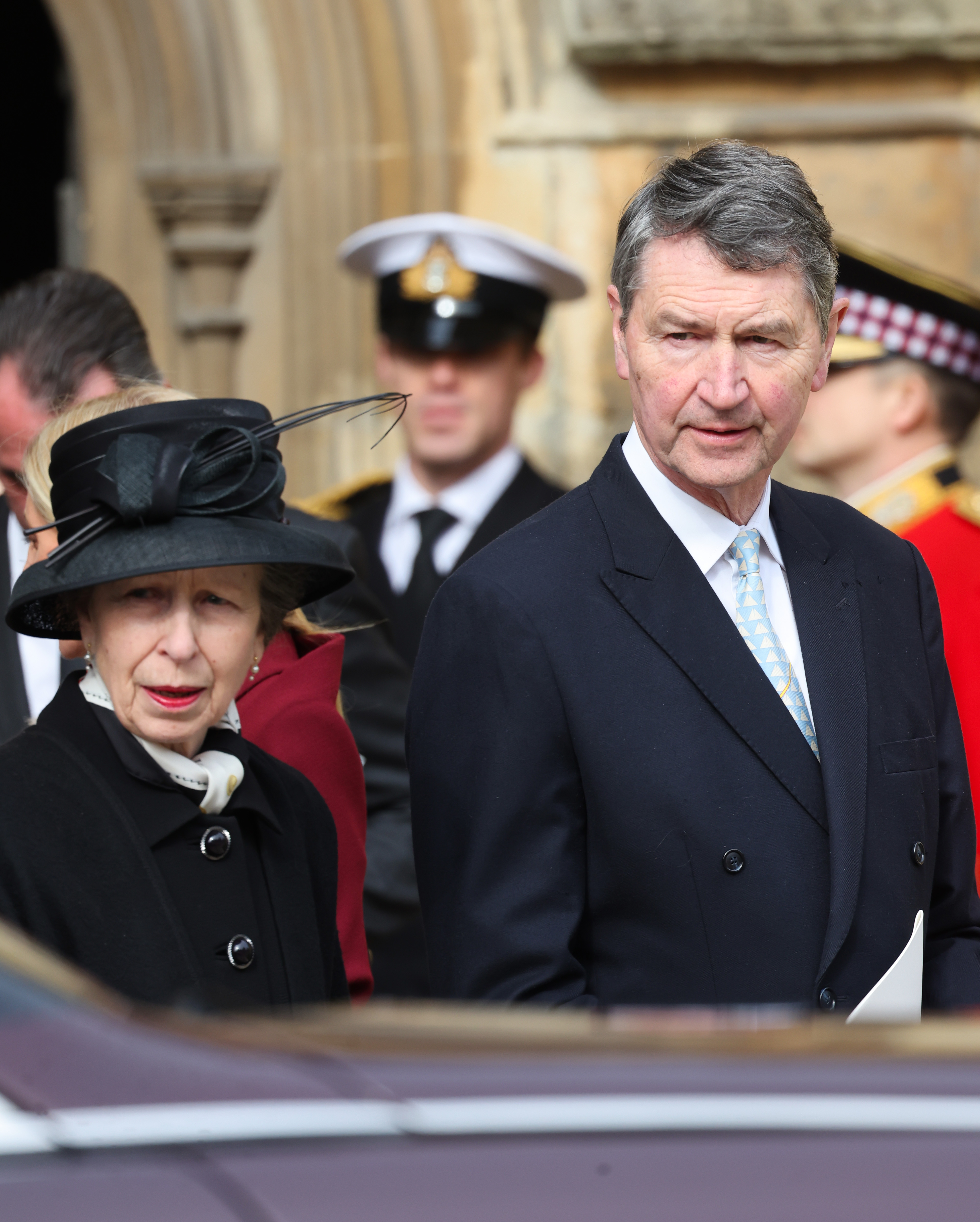 Princess Anne and Sir Timothy Laurence leaving the Thanksgiving Service for King Constantine of the Hellenes at St George's Chapel in Windsor, England on February 27, 2024 | Source: Getty Images