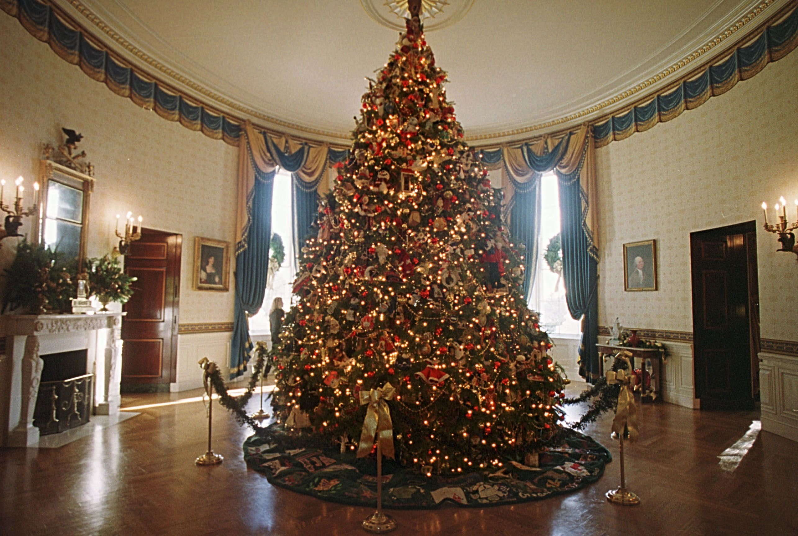 The White House Christmas tree in the Blue Room of the White House December 4, 2000 in Washington DC. | Source: Getty Images