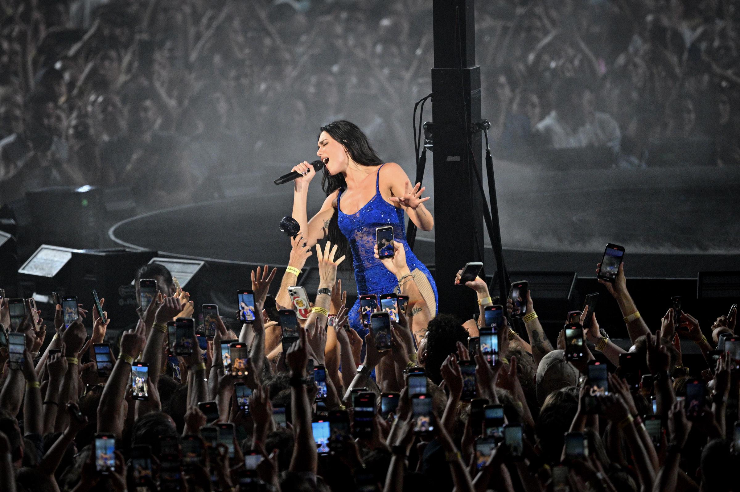 Dua Lipa performs on stage during her "Radical Optimism" tour at Wembley Stadium on June 20, 2025 in London, England | Source: Getty Images