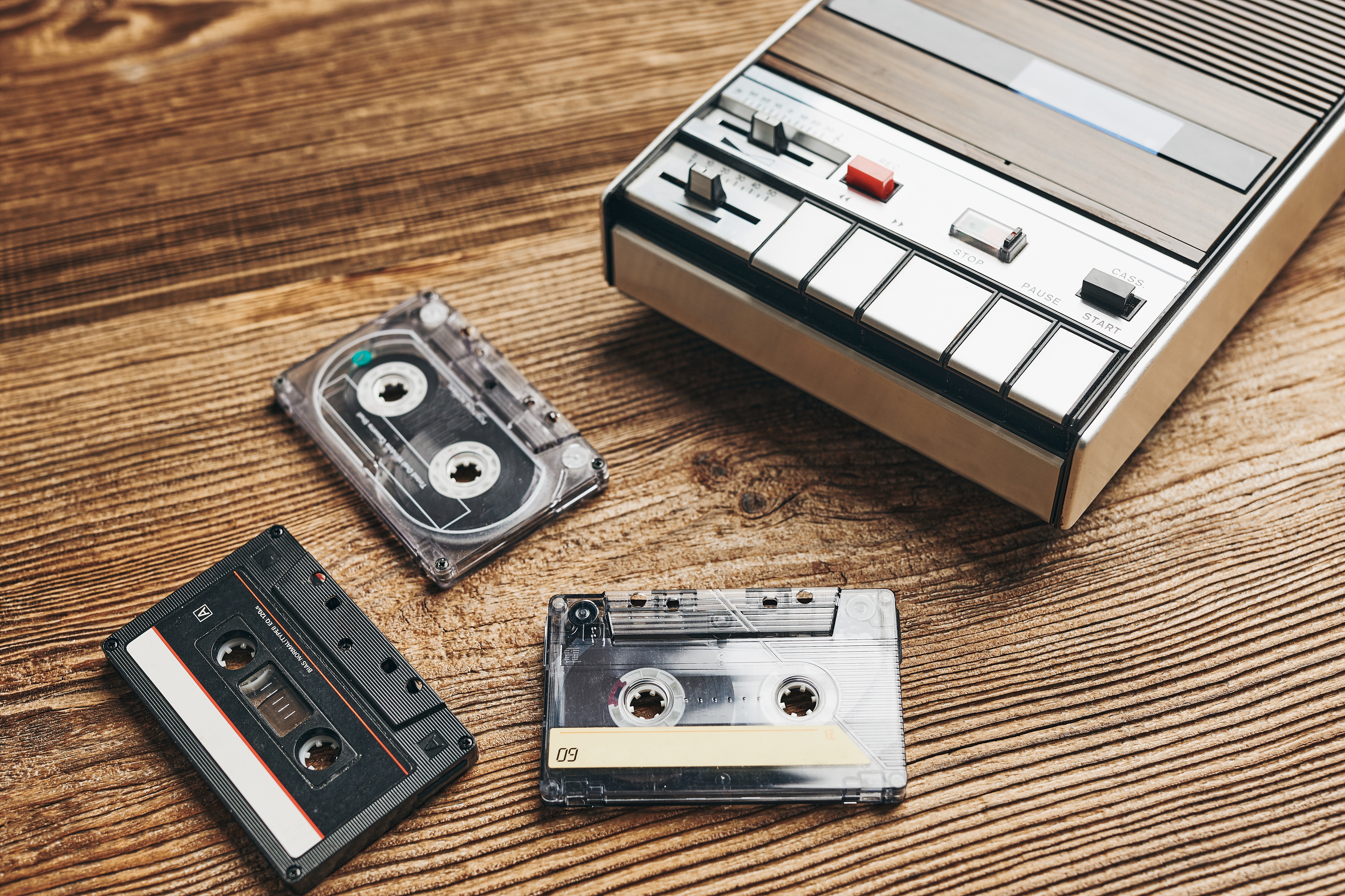 Compact cassette tapes and a cassette recorder | Source: Shutterstock