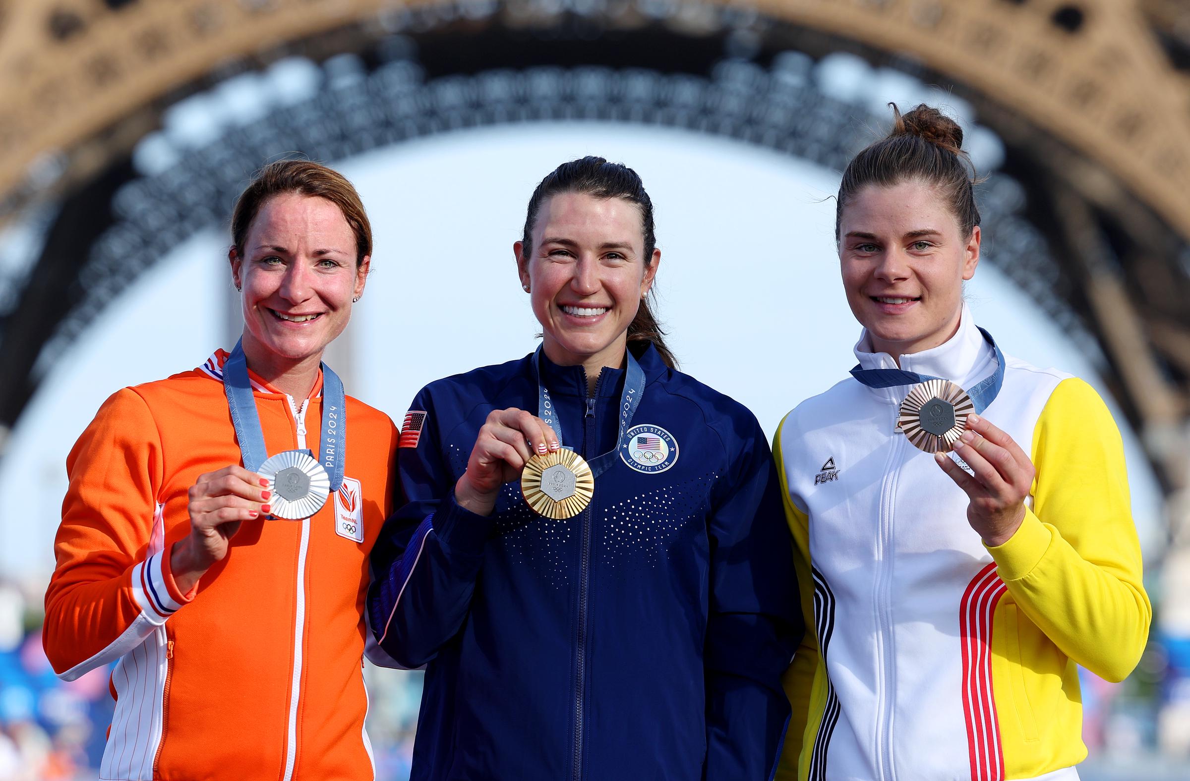 Marianne Vos, Kristen Faulkner and Lotte Kopecky posing with their medals after the Women's Road Race during the Paris Olympics in Paris, France on August 4, 2024 | Source: Getty Images