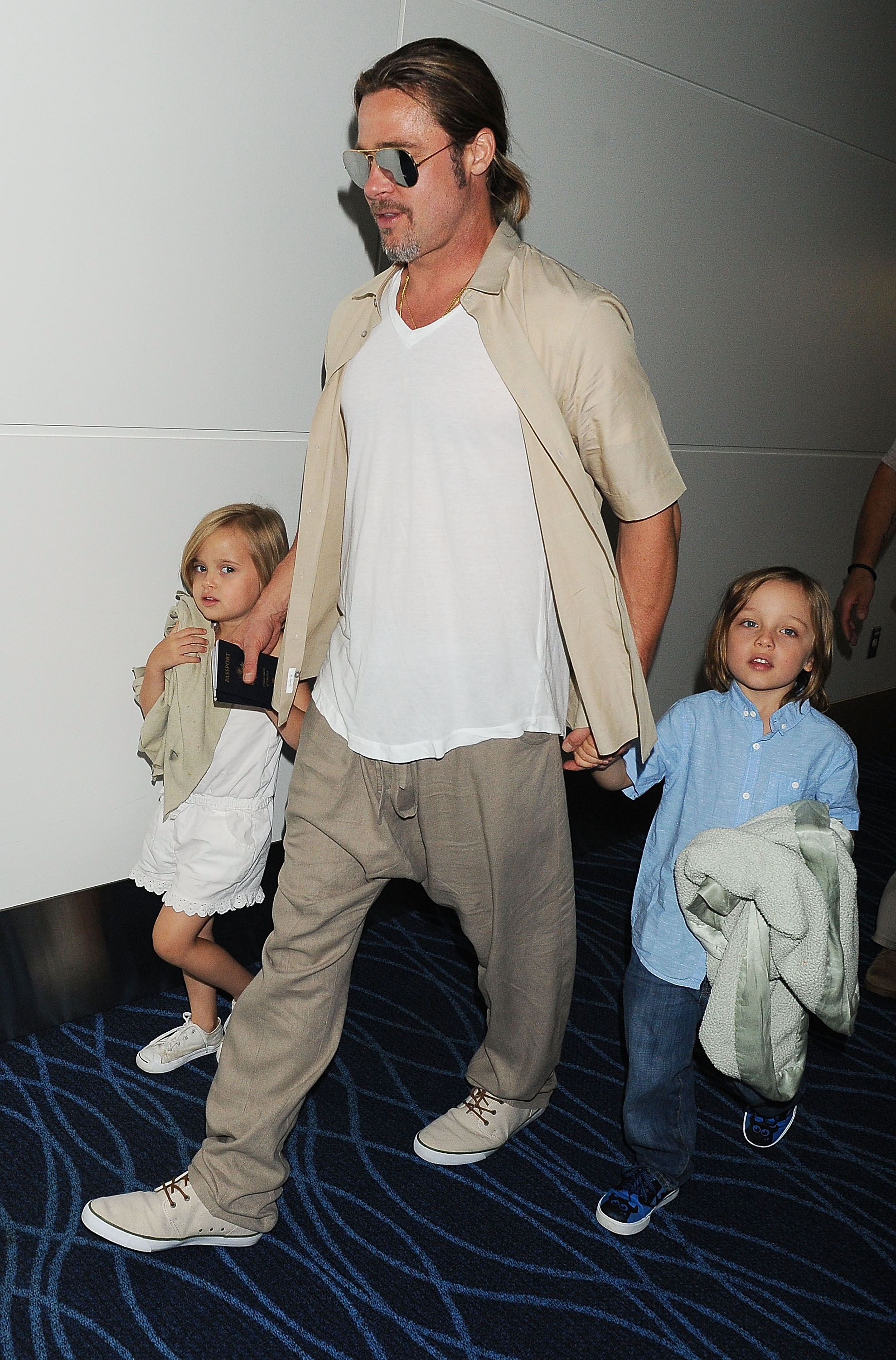Vivienne Jolie-Pitt, Brad Pitt, and Knox Jolie-Pitt and spotted on July 30, 2013 in Tokyo, Japan. | Source: Getty Images