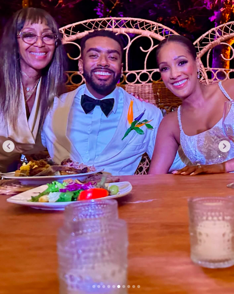 Robi Reed posing for a picture with Etienne Maurice and Stephanie Wash on their wedding day, posted on July 14, 2024 | Source: Instagram/iamrobireed