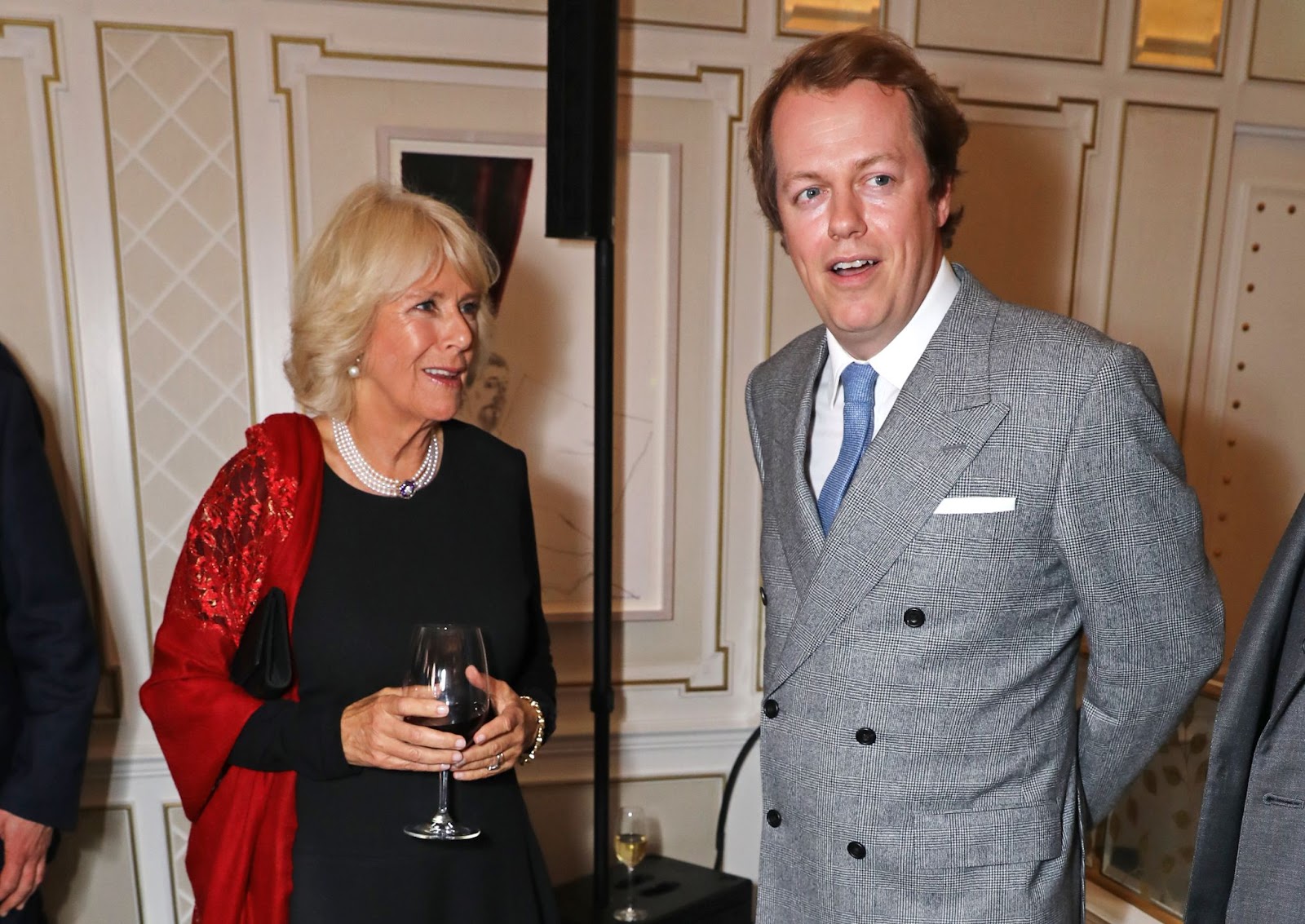 Queen Camilla and her son, Tom Parker Bowles, attended the launch of 'Fortnum & Mason: The Cook Book' on October 18, 2016, in London, England. The event celebrated Tom’s accomplishments as a food writer, with Camilla showing her support for his culinary career. | Source: Getty Images