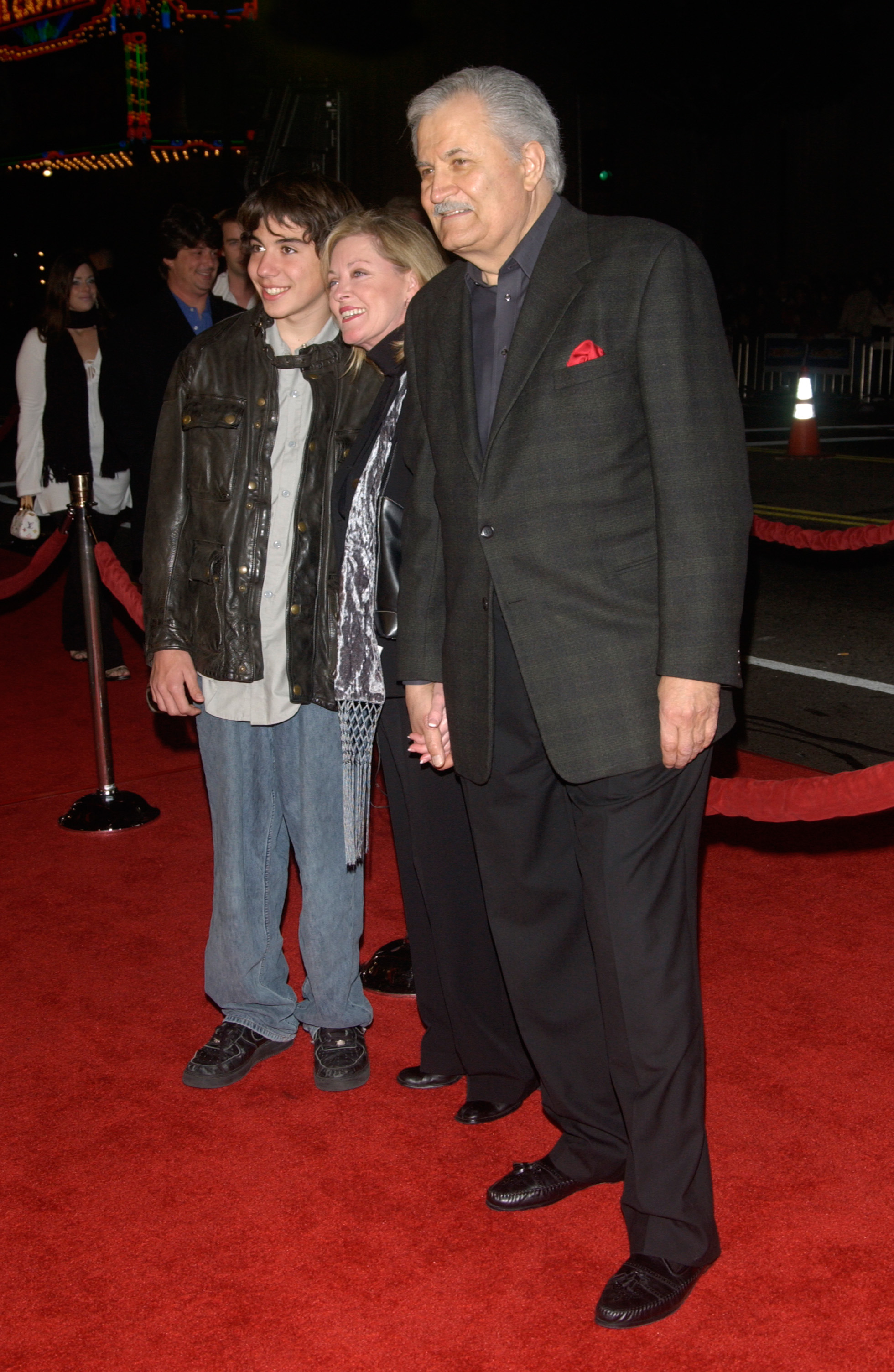 John Aniston with his wife Sherry Rooney and son Alexander  in California in 2004 | Source: Shutterstock