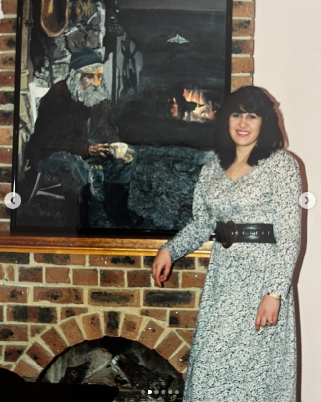 Kristy Adler's mother posing next to one of her paintings in a post dated April 15, 2025 | Source: Instagram/kristyadlerart