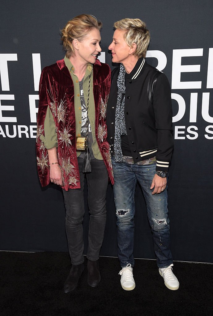 Portia De Rossi and Ellen DeGeneres attend the Saint Laurent show on February 10, 2016 in Los Angeles, California. | Source: Getty Images.