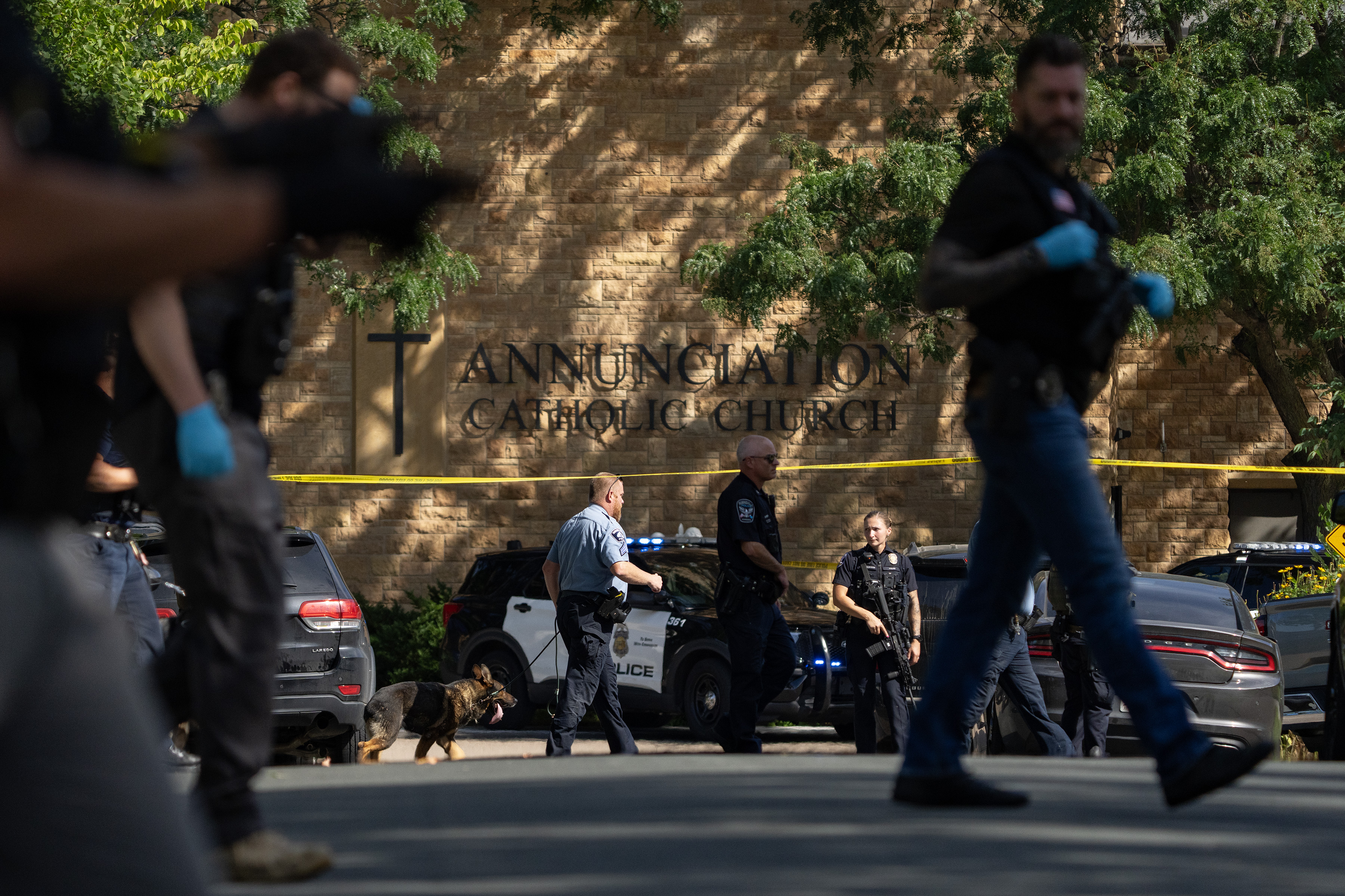 Law enforcement officers secure the area outside Annunciation Church in Minneapolis on August 27, 2025 | Source: Getty Images