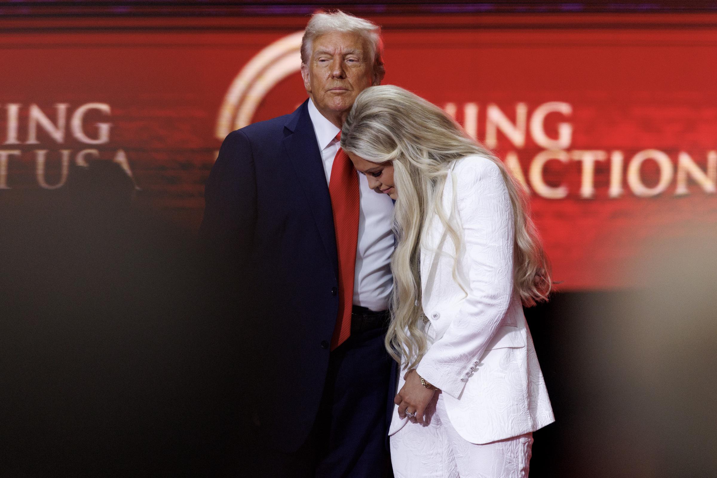 Erika Kirk joins President Donald Trump onstage during the public memorial service for Charlie Kirk at State Farm Stadium on September 21, 2025 | Source: Getty Images