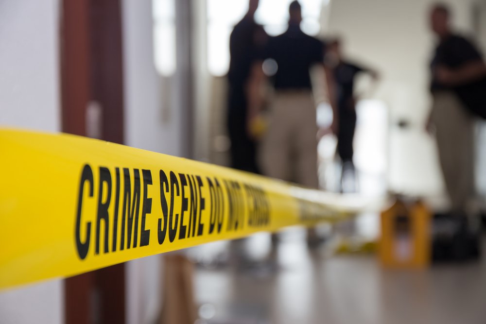 Crime scene tape in building. | Photo: Shutterstock