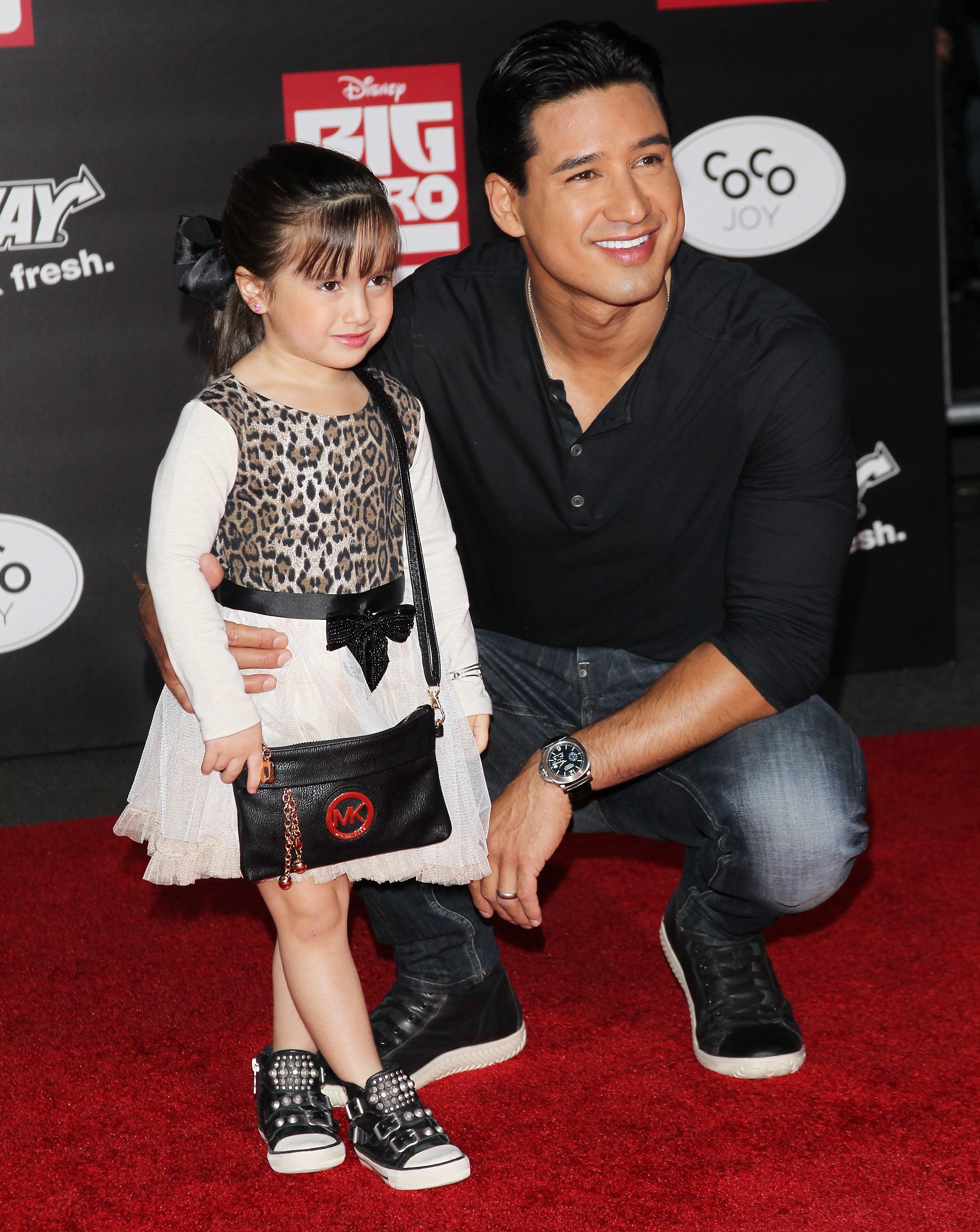 Mario Lopez and daughter Gia Francesca Lopez attend the Los Angeles premiere of "Big Hero 6" on November 4, 2014, in Hollywood, California. | Source: Getty Images