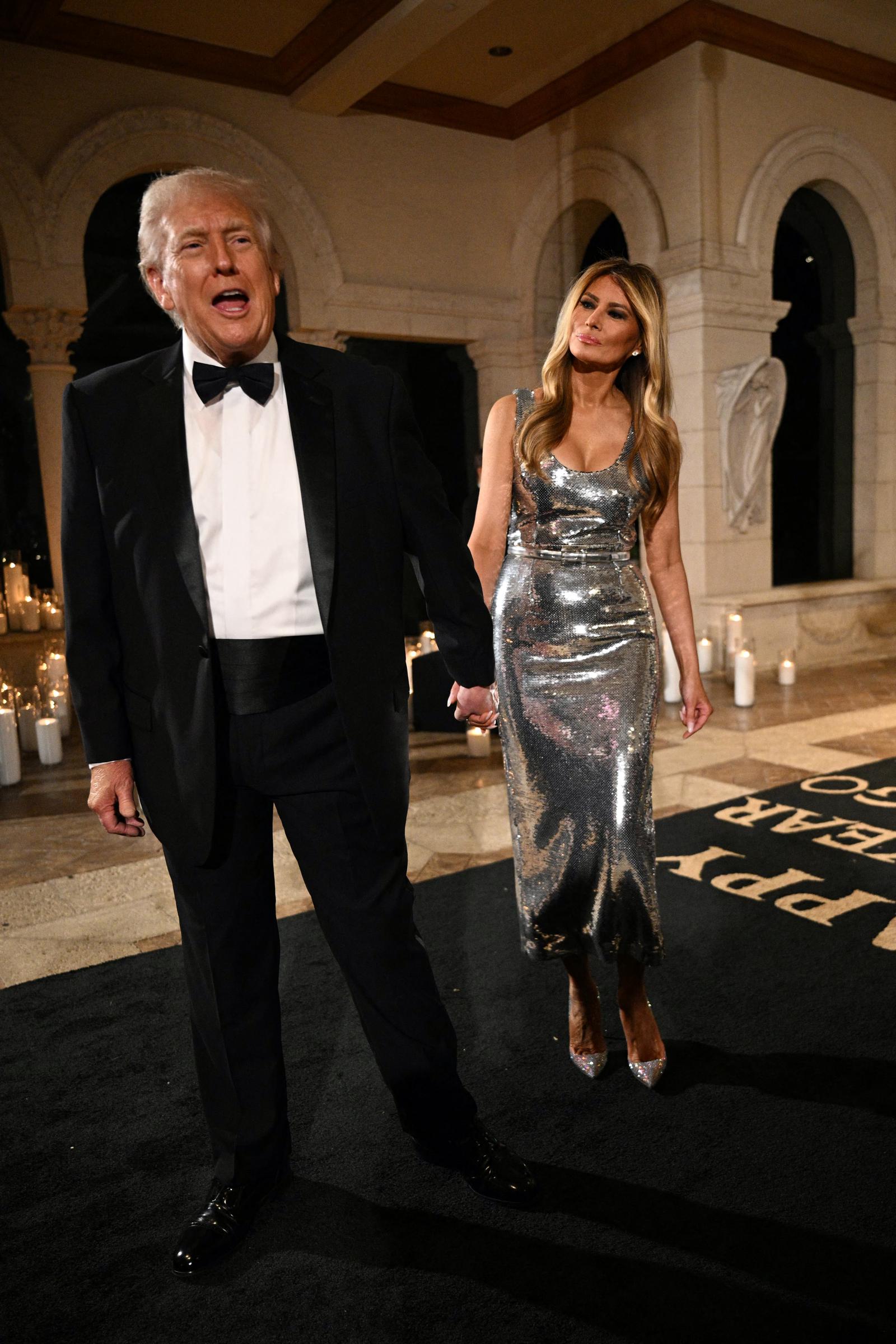 Donald Trump and Melania Trump arrive for a New Year’s Eve event at Mar-a-Lago on December 31, 2025, in Palm Beach, Florida | Source: Getty Images