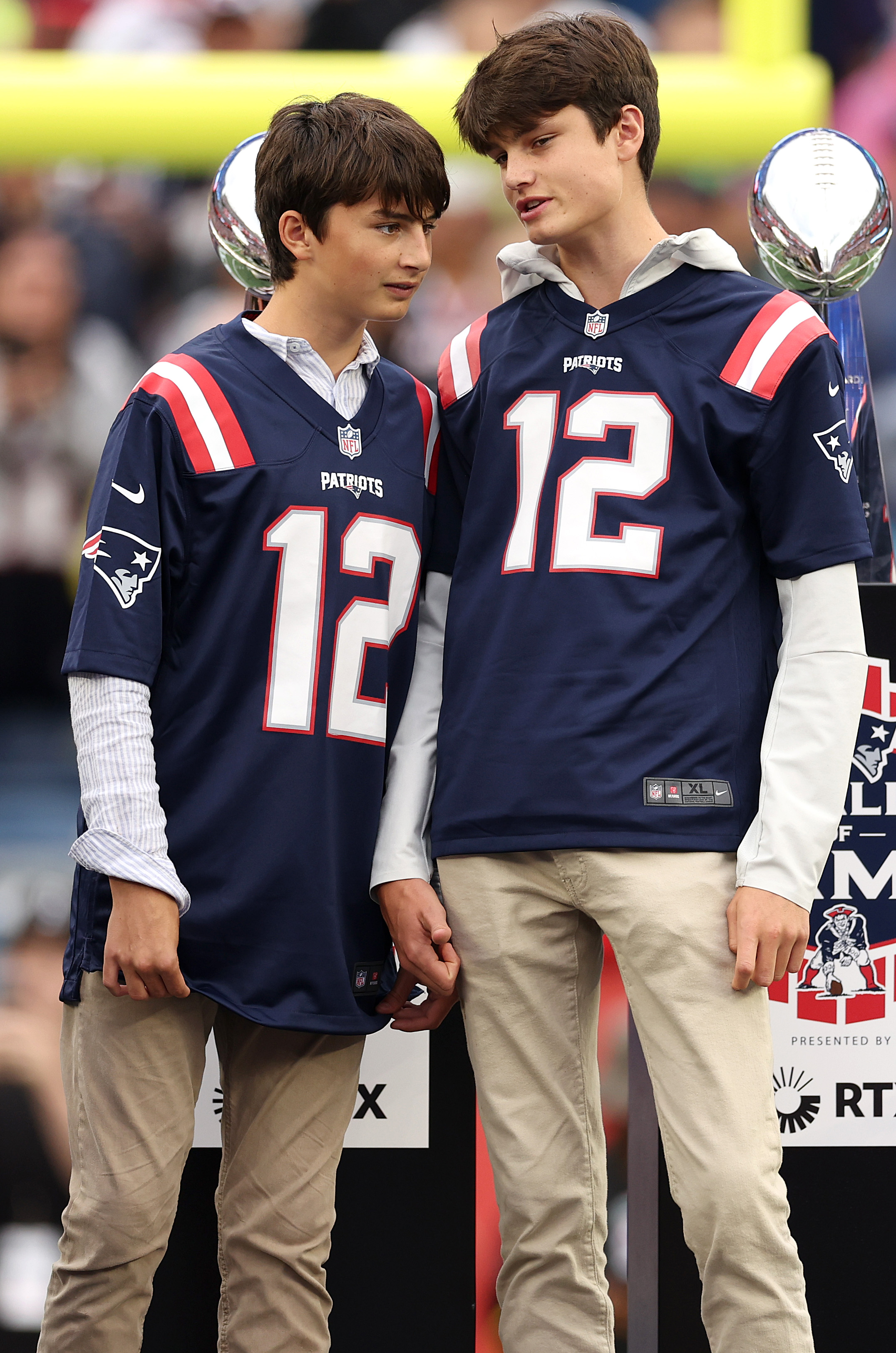 Benjamin Rein and Jack Moynahan, talk together during a ceremony honoring Tom Brady at Gillette Stadium in Foxborough, Massachusetts, on September 10, 2023 | Source: Getty Images