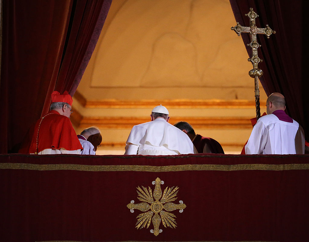 Newly elected Pope Francis I leaves the central balcony of St Peter's Basilica on March 13, 2013 in Vatican City, Vatican. Argentinian Cardinal Jorge Mario Bergoglio was elected as the 266th Pontiff and will lead the world's 1.2 billion Catholics