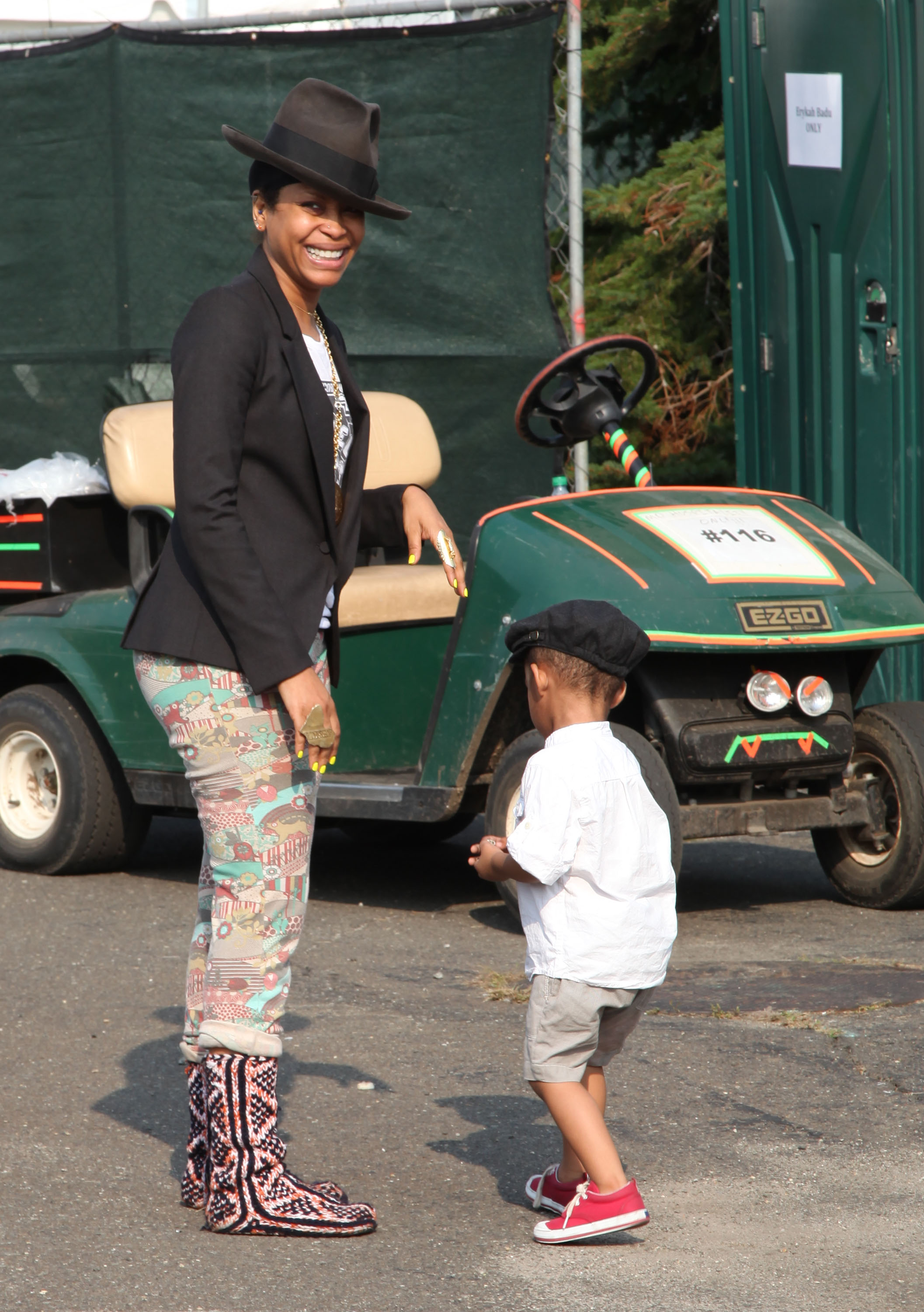 Erykah Badu and her son, Seven Sirius Benjamin, at the 8th Annual Rock The Bells Festival on September 3, 2011, in New York City | Source: Getty Images