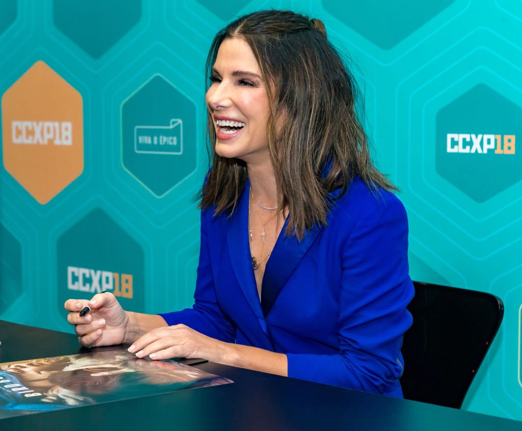 Sandra Bullock signs autographs at Comic-Con São Paulo on December 9, 2018 in Sao Paulo, Brazil | Photo: Getty Images
