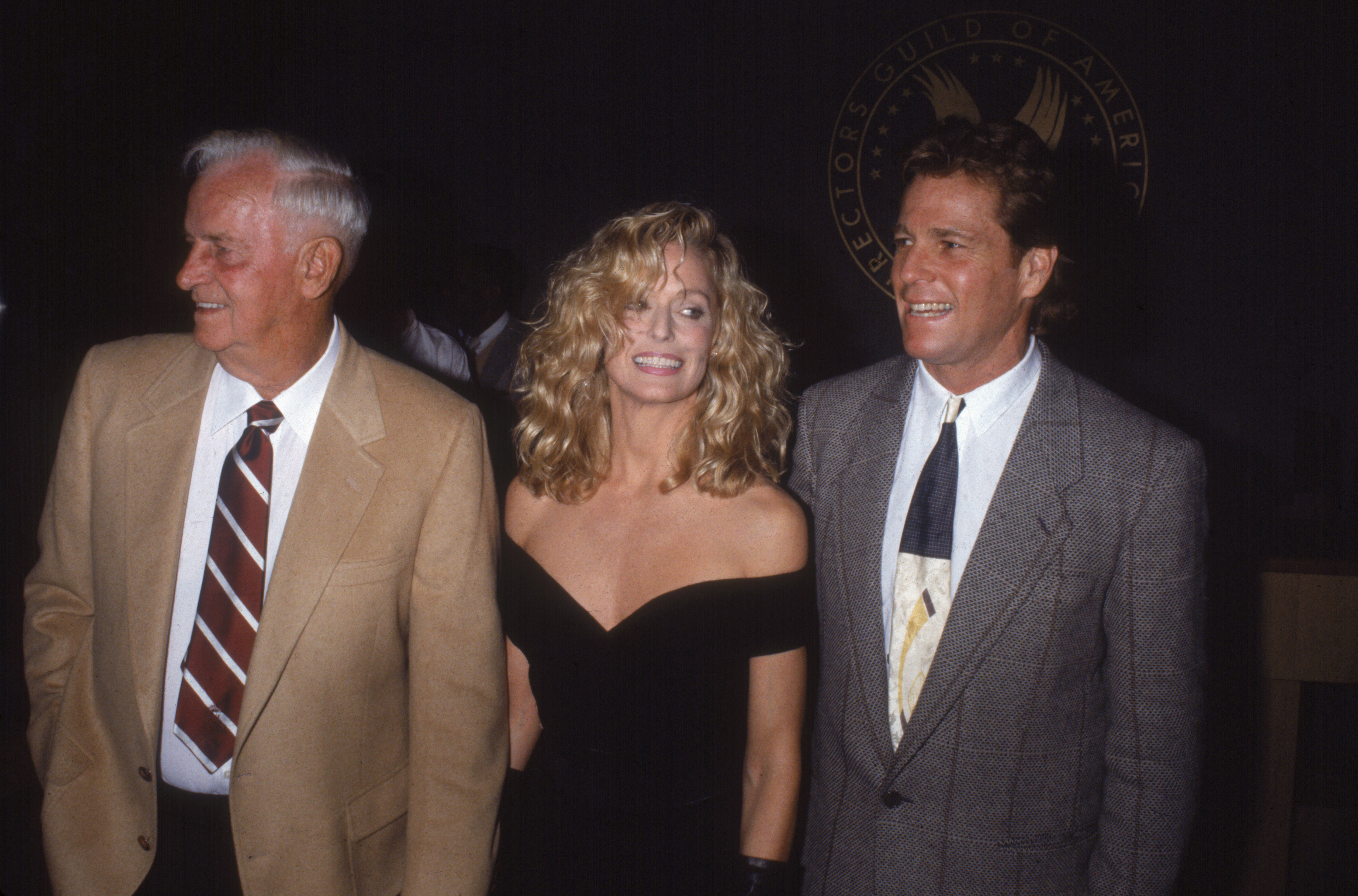 James Fawcett and Farrah Fawcett with Ryan O'Neal at the "Cry Freedom" premiere in Universal City, 1987 | Source: Getty Images