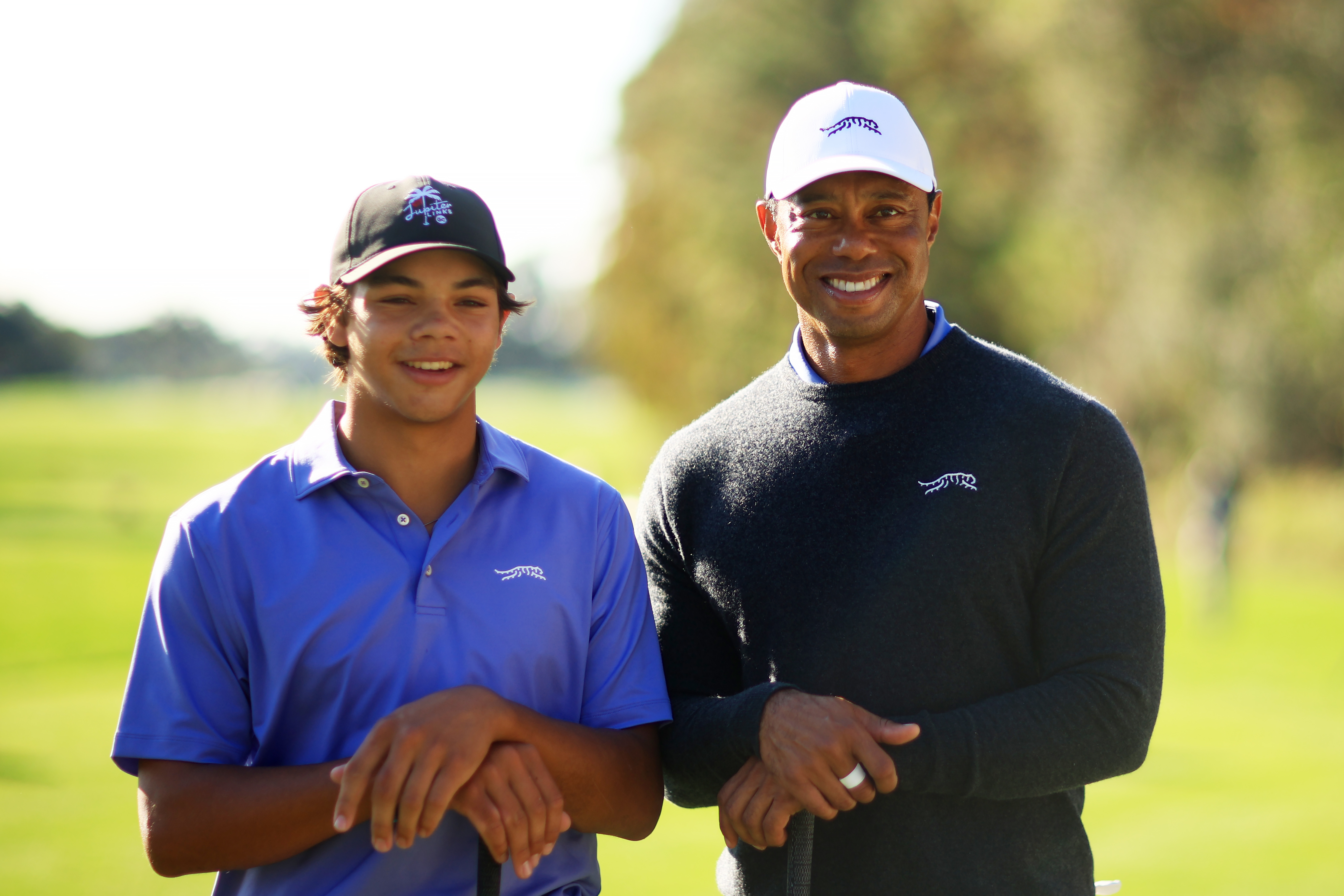 Charlie and Tiger Woods on December 20, 2024, in Orlando, Florida | Source: Getty Images