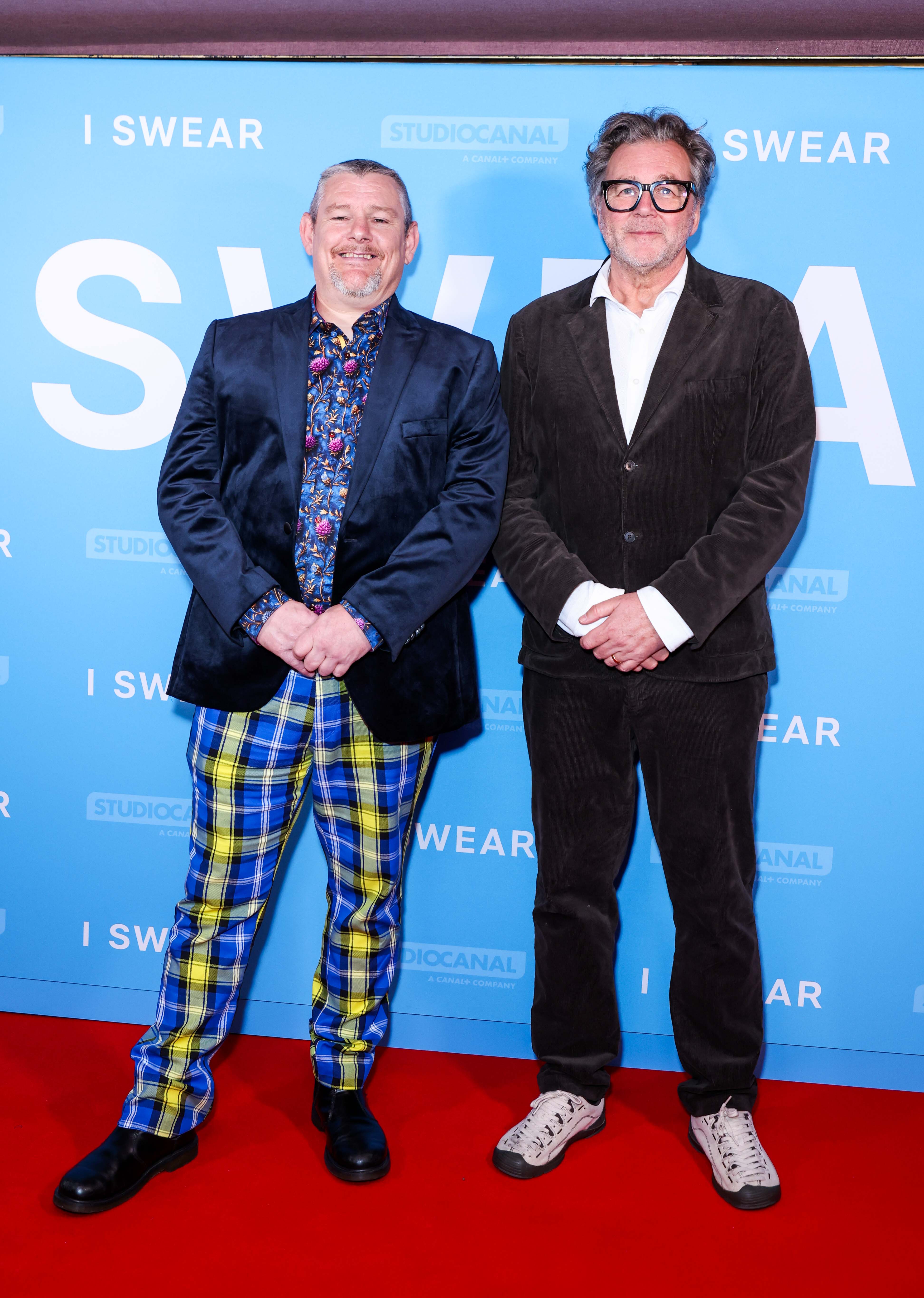 John Davidson and Kirk Jones attend the "I Swear" London gala screening at Curzon Mayfair in England on September 29, 2025. | Source: Getty Images