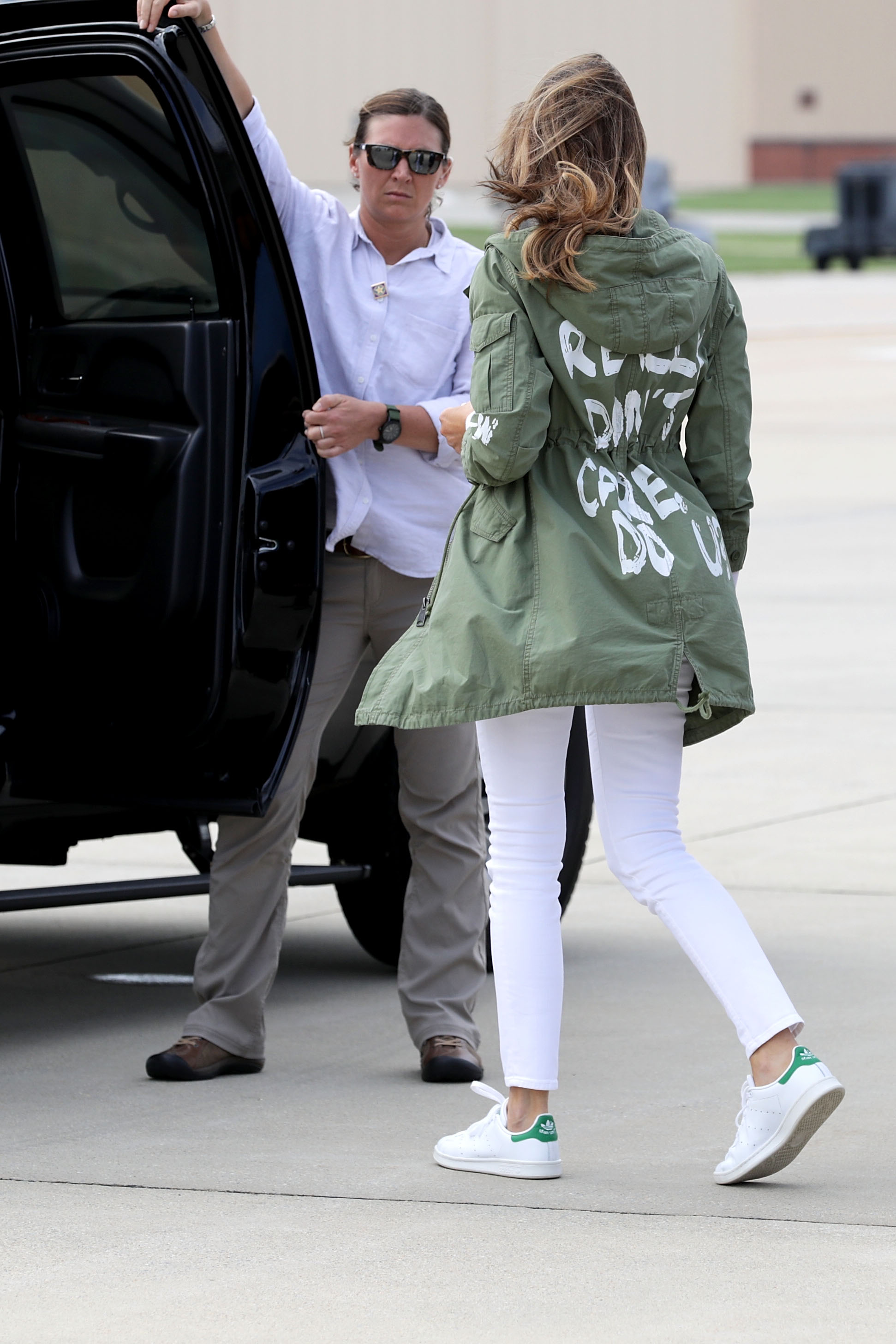 Melania Trump departs Andrews Air Rorce Base in Maryland June 21, 2018 wearing a jacket emblazoned with the words "I really don't care, Do U?" following her surprise visit with child migrants on the US-Mexico border | Source: Getty Images