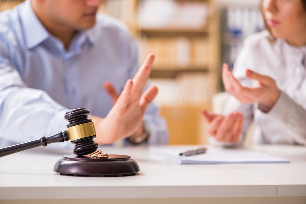 A photo of a judge's gavel deciding on marriage divorce. | Photo: Shutterstock
