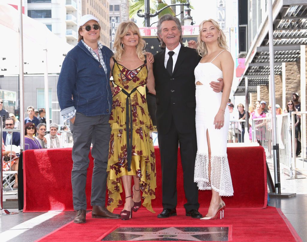 Boston Russell, Goldie Hawn, Kurt Russell, and actor Kate Hudson attending Hawn and Kurt's Star On the Hollywood Walk of Fame ceremony on May 4, 2017, in California | Photo: Jesse Grant/Getty Images