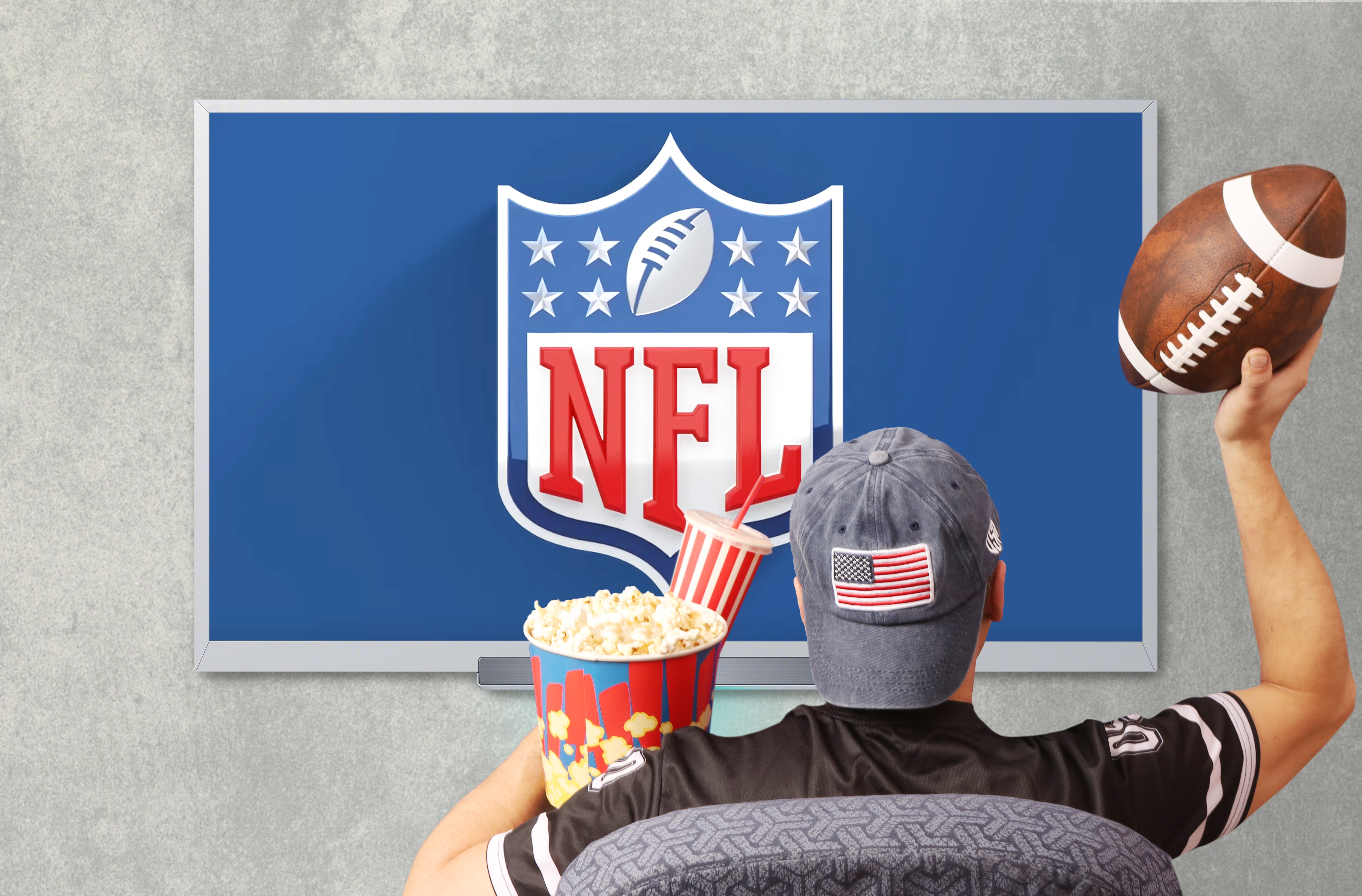 A man watching NFL on TV | Source: Shutterstock