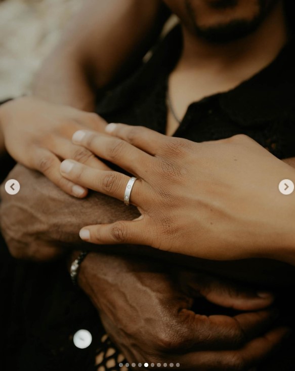 Greg Mathis Jr. and Elliott Cooper showing off the former's engagement ring while posing for their engagement announcement photoshoot in an image uploaded on July 19, 2024 | Source: Instagram/gregmathisjr