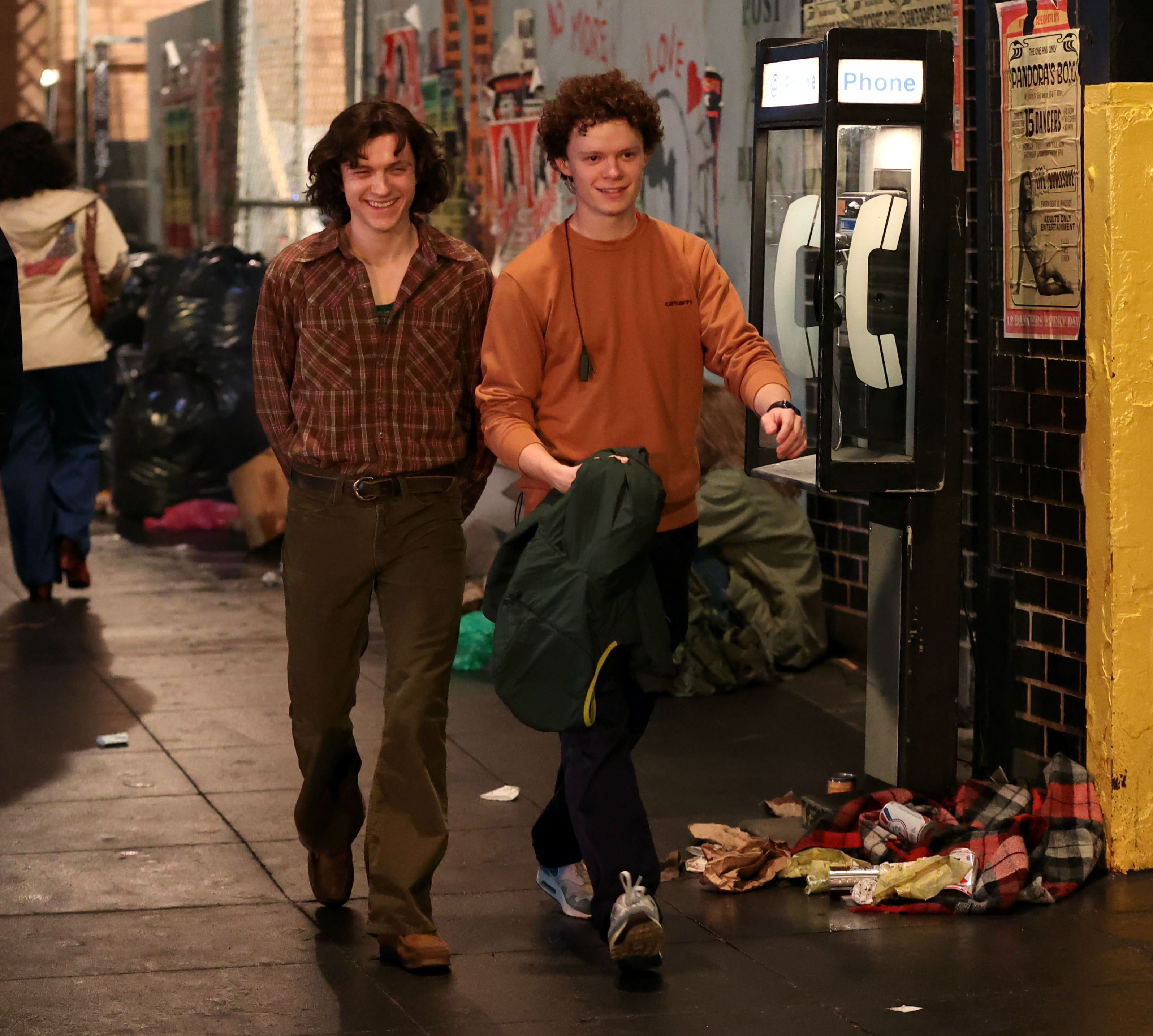 Tom Holland and his brother Harry on the set of "The Crowded Room" in 2022 in New York City. | Source: Getty Images