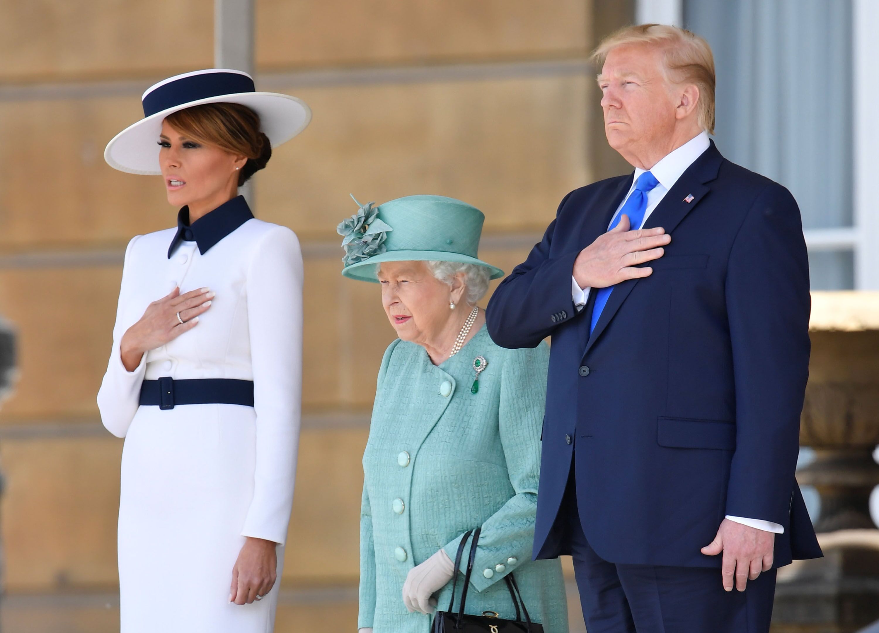 Melania Trump, Queen Elizabeth II and U.S. President Donald Trump at the Ceremonial Welcome in Buckingham Palace in 2019 | Source: Getty Images