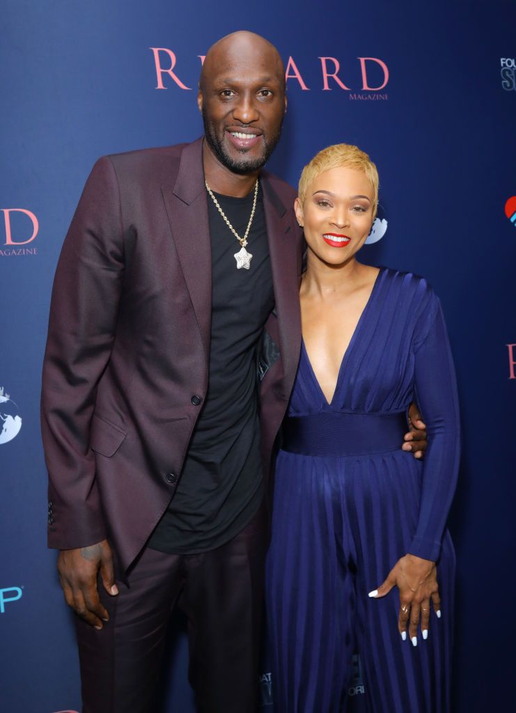 NBA star Lamar Odom and life coach Sabrina Parr at Regard Magazine and Coin Up app's 'Regard Cares' event at Palihouse West Hollywood in October 2019. | Photo: Getty Images