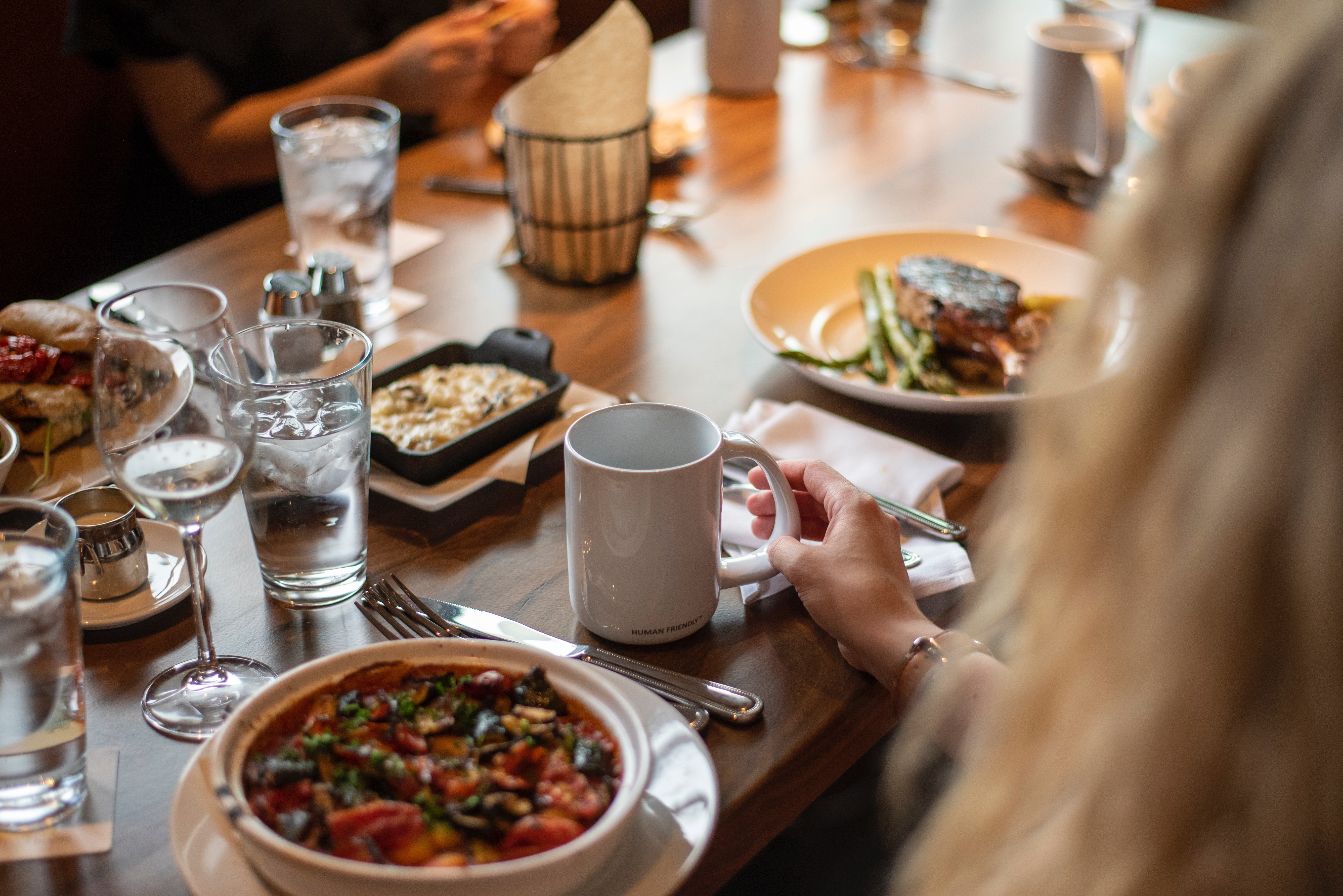 My mom forced me to accompany her to the restaurant | Photo: Unsplash
