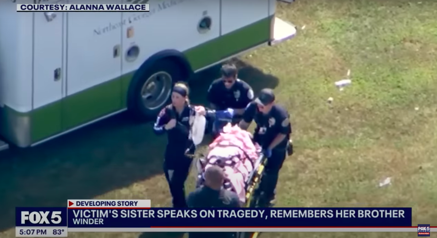 Authorities and medical personnel tending to a victim on a gurney, posted on September 5, 2024 | Source: YouTube/FOX 5 Atlanta