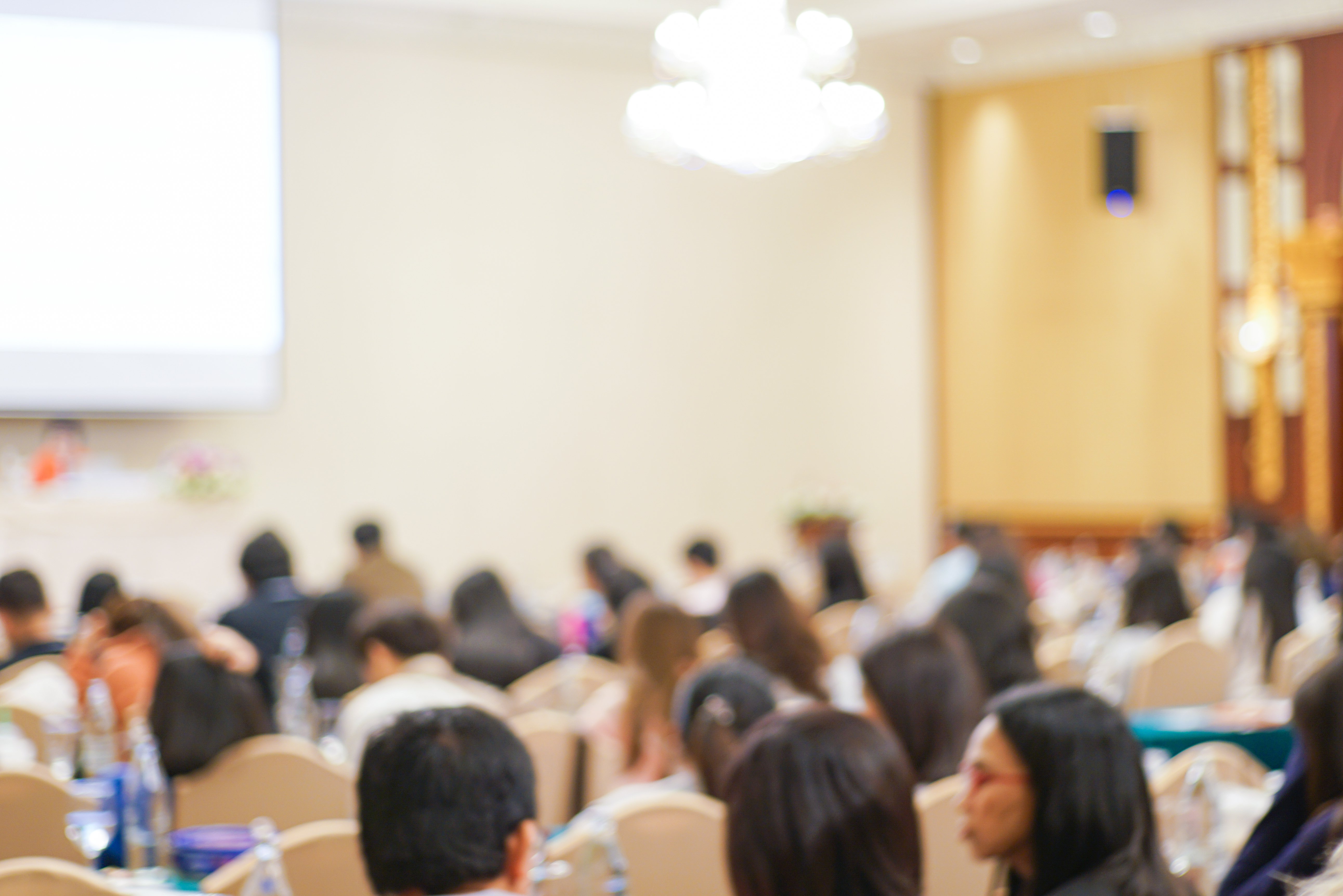 A lecture hall full of university students.│Source: Shutterstock