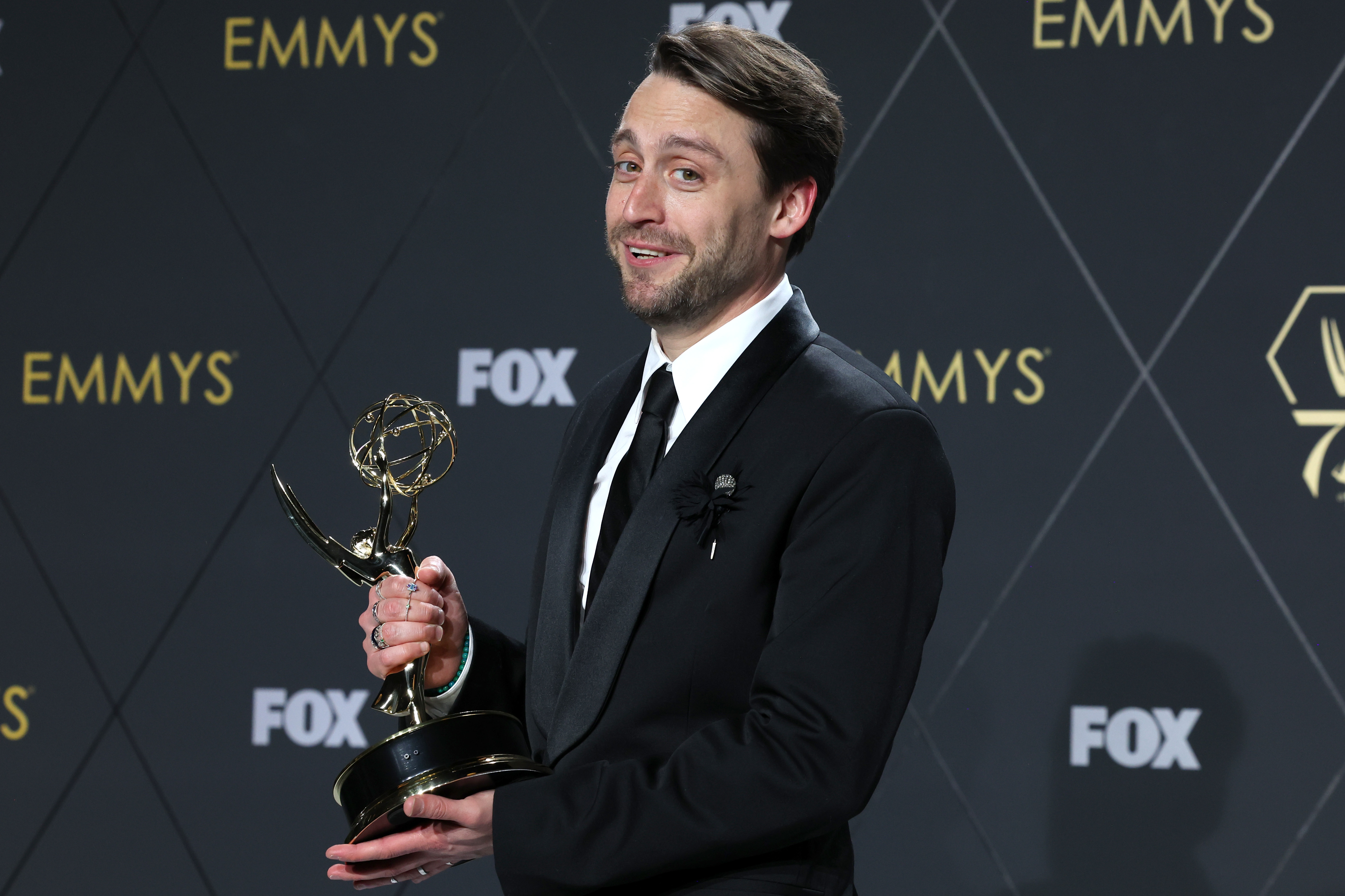 Kieran Culkin holding his award for Best Actor in a Drama Series for "Succession" as he poses in the press room during the 75th Primetime Emmy Awards on January 15, 2024, in Los Angeles, California | Source: Getty Images