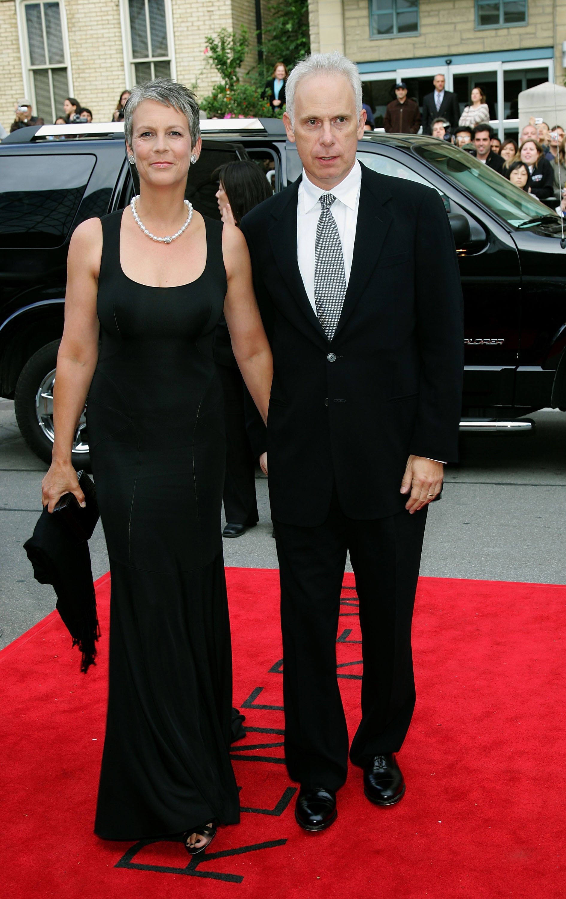 Jamie Lee Curtis and her husband Christopher Guest arrive at the Toronto International Film Festival gala presentation of the film "For Your Consideration" at the Roy Thomson Hall on September 10, 2006 in Toronto, Canada | Source: Getty Images