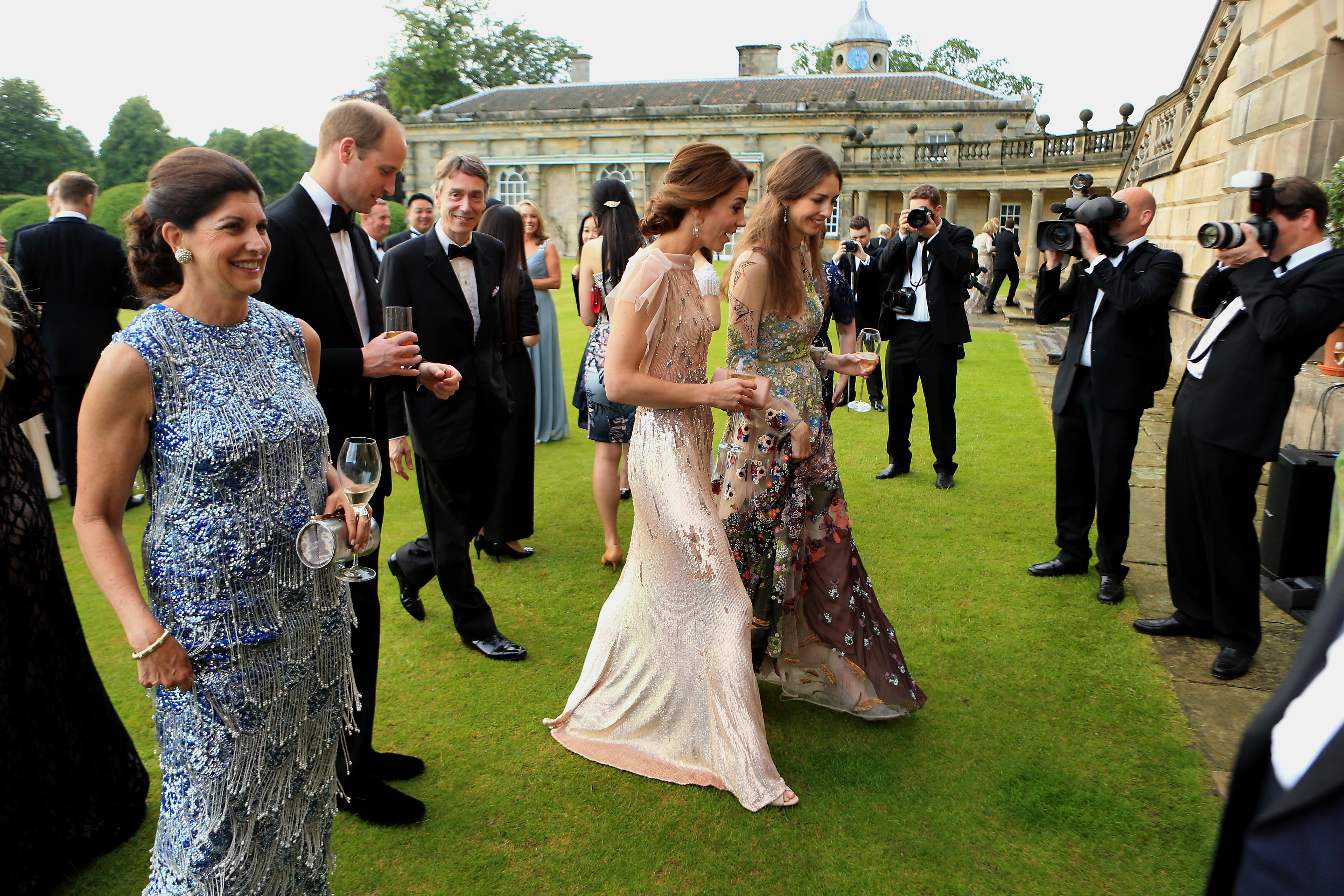 Prince William, Catherine, Duchess of Cambridge, David Cholmondeley, Marquess of Cholmondeley and Rose Cholmondeley, the Marchioness of Cholmondeley at a gala dinner on June 22, 2016 in King's Lynn, England | Source: Getty Images