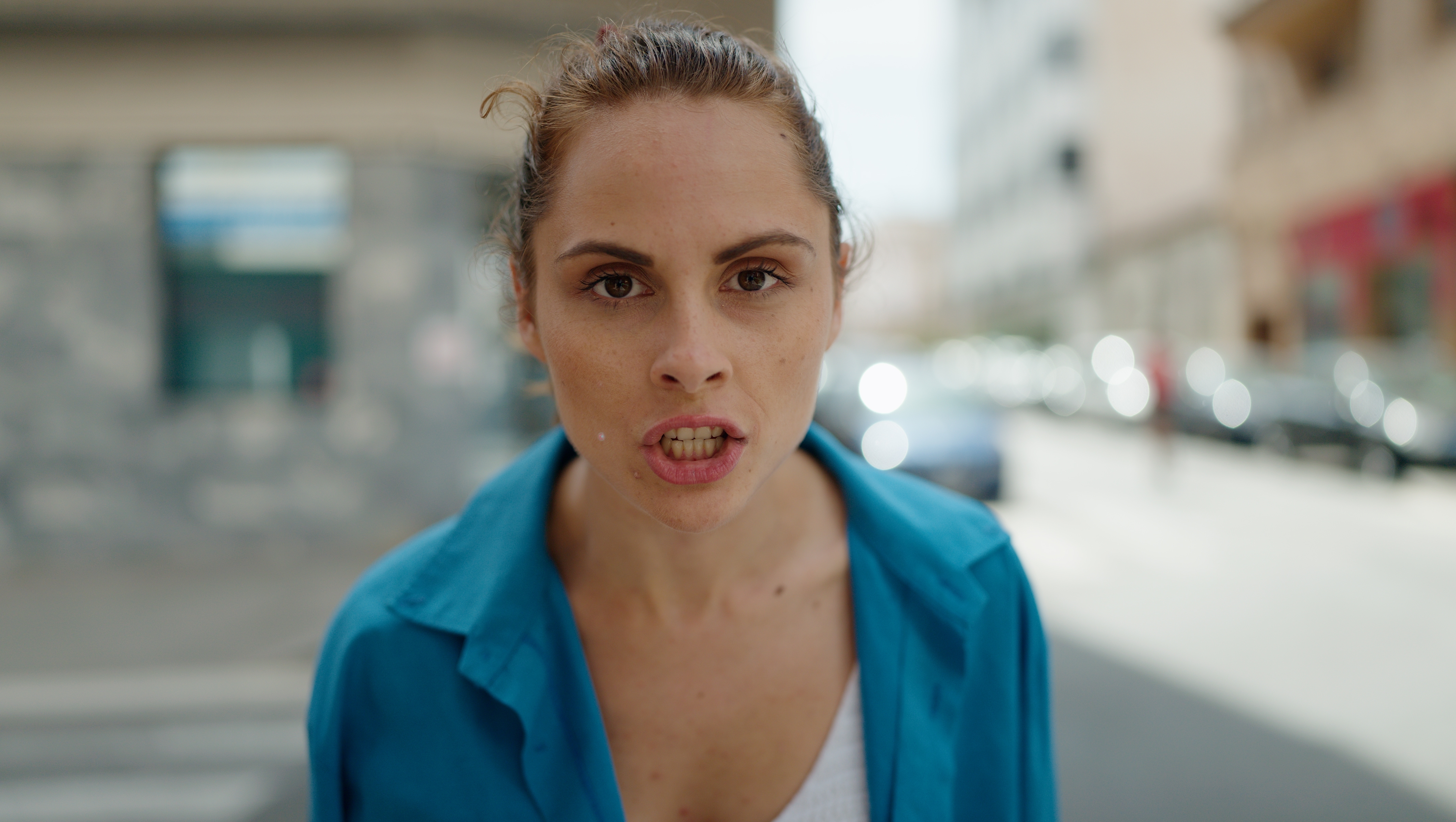 Woman talking in anger | Shutterstock