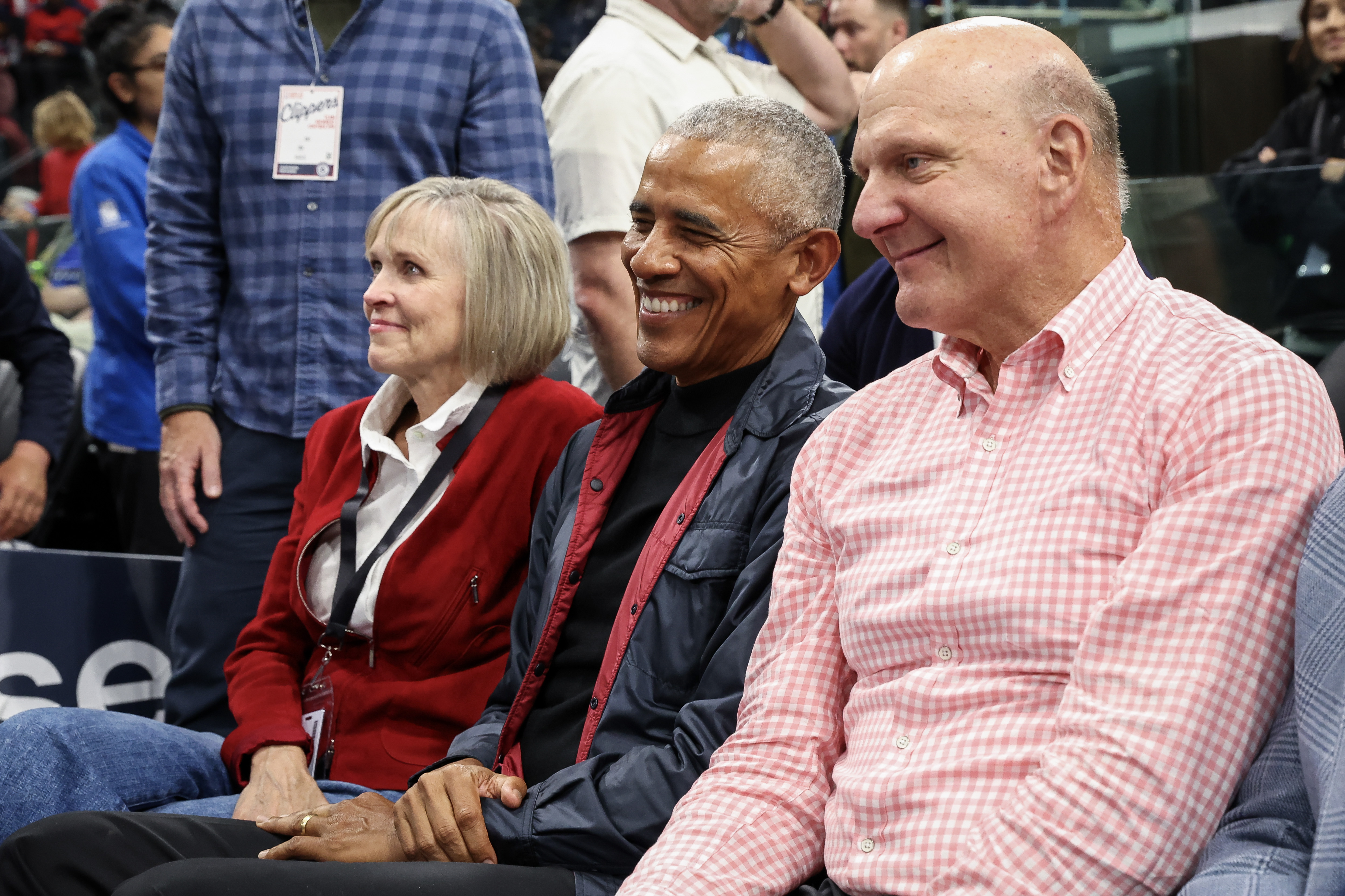 Connie Snyder, Barack Obama, and Steve Ballmer pictured during a basketball game on March 5, 2025, in Inglewood, California. | Source: Getty Images