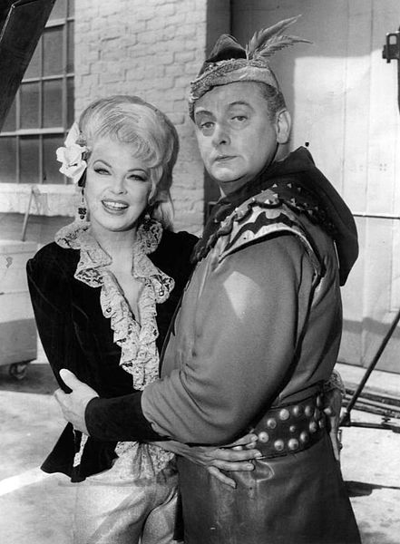 Photo of Art Carney as the Archer and Barbara Nichols from the television program "Batman." | Source: WIkimedia Commons